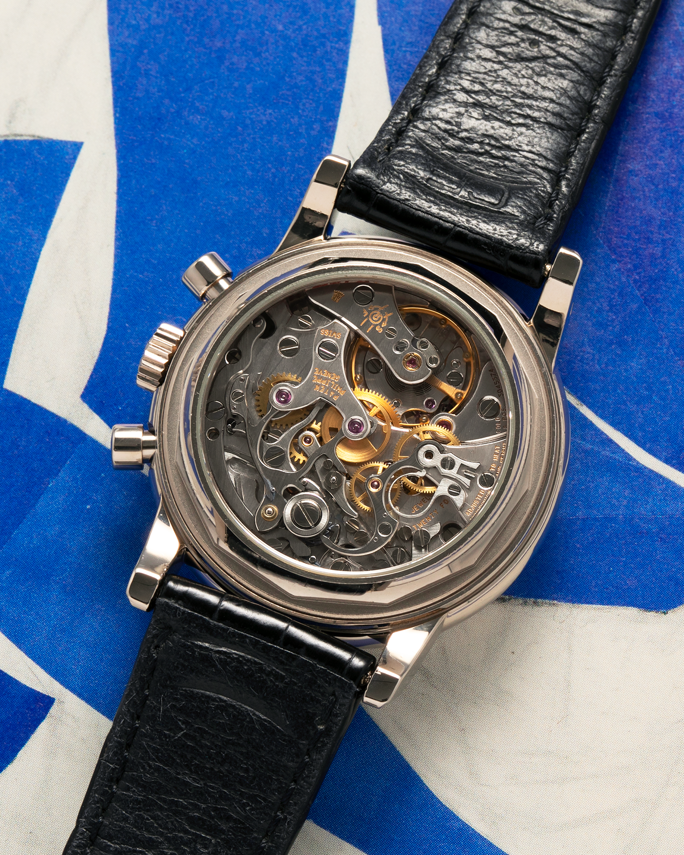 Brand: Patek Philippe
Year: 1995
Model: Perpetual Calendar Chronograph ‘4th Series’
Reference Number: 3970EG
Material: 18-carat White Gold
Movement: Patek Philippe Cal. 27-70 Q (Based on Lemania Cal. 2310), Self-Winding
Movement Number: 3045XXX
Case Dimensions: 36mm x 13mm (43.3mm Lug-to-Lug)
Lug Width: 19mm
Strap: Patek Philippe Black Alligator Leather Strap with Signed 18-carat White Gold Deployant Clasp