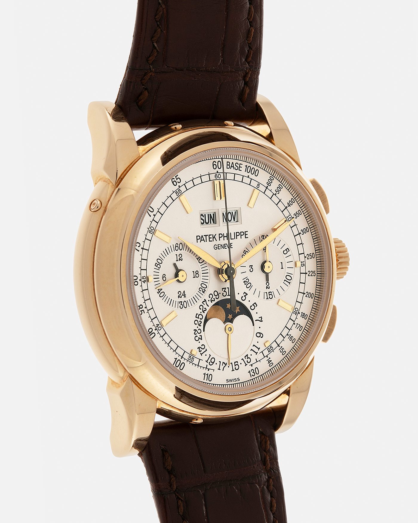 Brand: Patek Philippe
Year: 2008
Model: Perpetual Calendar Chronograph
Reference Number: 5970J
Material: 18-carat Yellow Gold
Movement: Patek Philippe Cal. 27-70 Q (Based on Lemania Cal. 2310), Manual-Winding
Case Dimensions: 40mm x 13.5mm (Lug-to-Lug 46.5mm)
Lug Width: 21mm
Strap: Patek Philippe Dark Brown Alligator Leather Strap with Signed 18-carat Yellow Gold Deployant Clasp
