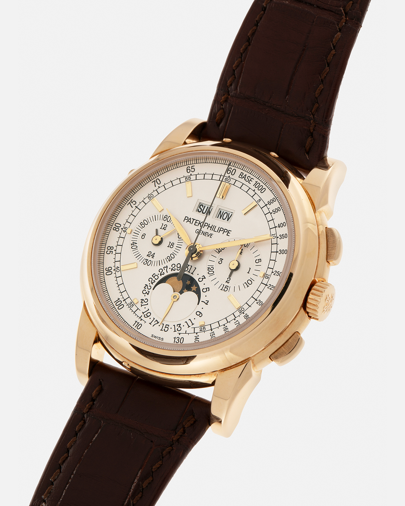 Brand: Patek Philippe
Year: 2008
Model: Perpetual Calendar Chronograph
Reference Number: 5970J
Material: 18-carat Yellow Gold
Movement: Patek Philippe Cal. 27-70 Q (Based on Lemania Cal. 2310), Manual-Winding
Case Dimensions: 40mm x 13.5mm (Lug-to-Lug 46.5mm)
Lug Width: 21mm
Strap: Patek Philippe Dark Brown Alligator Leather Strap with Signed 18-carat Yellow Gold Deployant Clasp