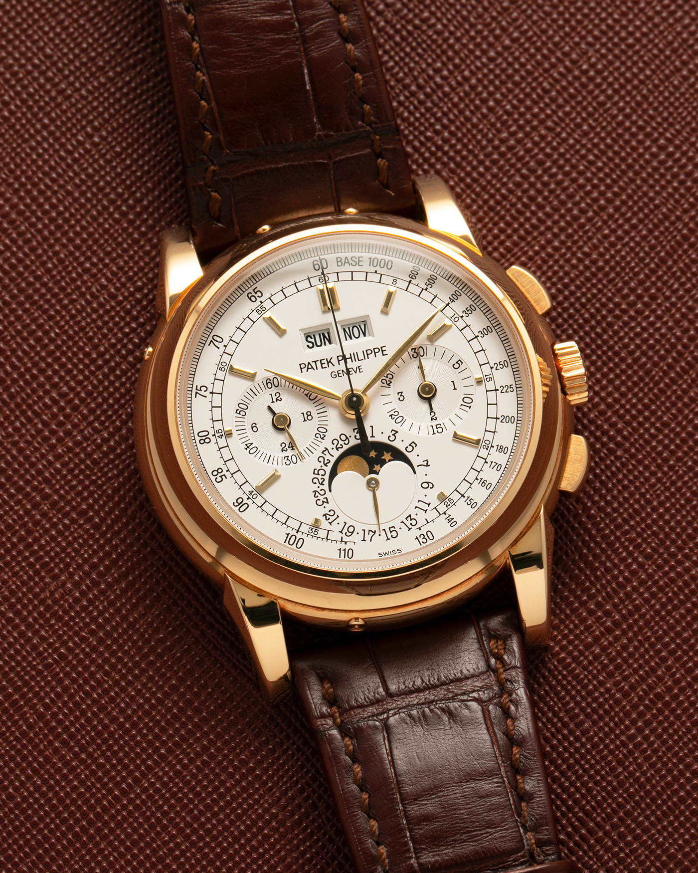 Brand: Patek Philippe
Year: 2008
Model: Perpetual Calendar Chronograph
Reference Number: 5970J
Material: 18-carat Yellow Gold
Movement: Patek Philippe Cal. 27-70 Q (Based on Lemania Cal. 2310), Manual-Winding
Case Dimensions: 40mm x 13.5mm (Lug-to-Lug 46.5mm)
Lug Width: 21mm
Strap: Patek Philippe Dark Brown Alligator Leather Strap with Signed 18-carat Yellow Gold Deployant Clasp