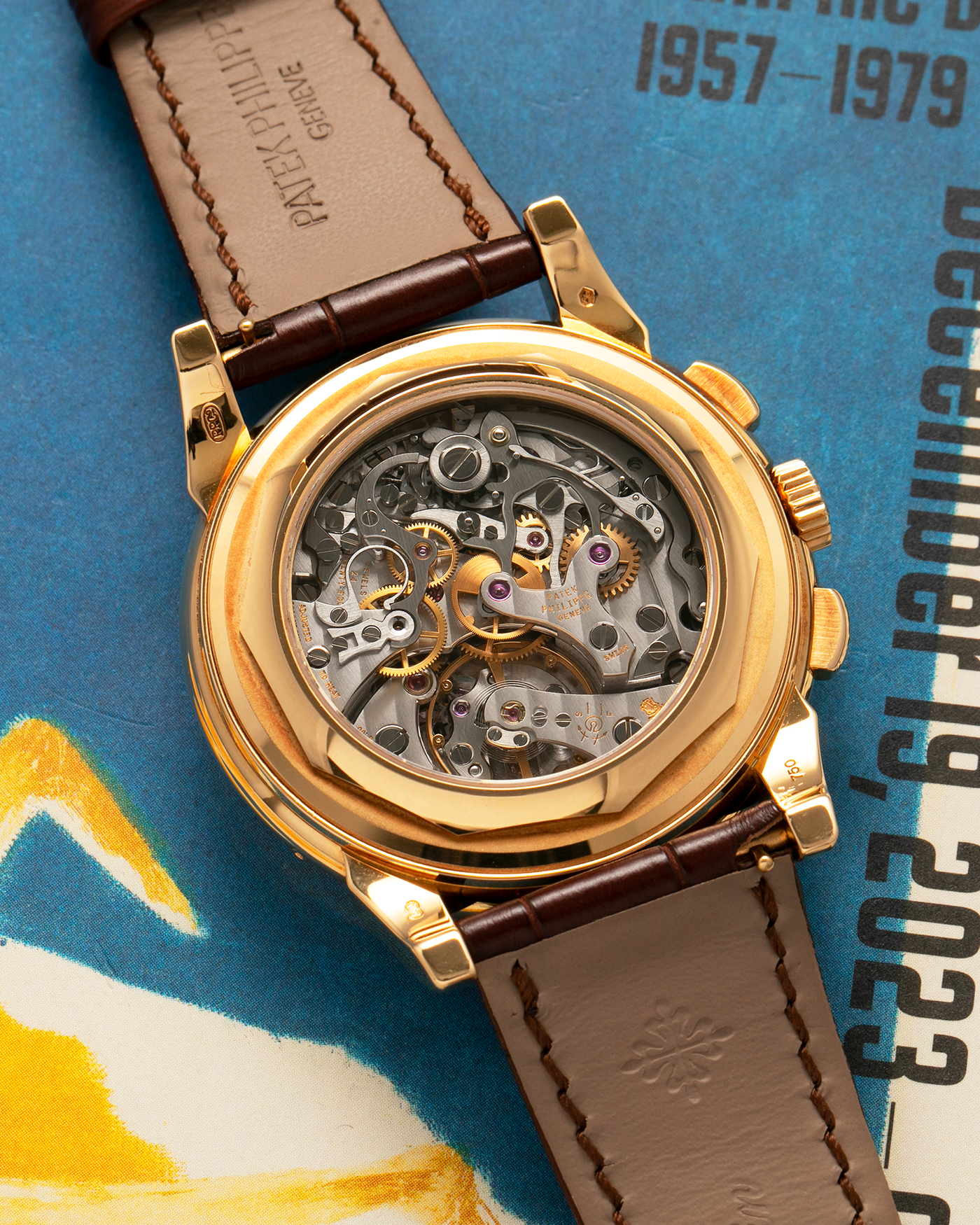 Brand: Patek Philippe
Year: 2008
Model: Perpetual Calendar Chronograph
Reference Number: 5970J
Material: 18-carat Yellow Gold
Movement: Patek Philippe Cal. 27-70 Q (Based on Lemania Cal. 2310), Manual-Winding
Case Dimensions: 40mm x 13.5mm (Lug-to-Lug 46.5mm)
Lug Width: 21mm
Strap: Patek Philippe Dark Brown Alligator Leather Strap with Signed 18-carat Yellow Gold Deployant Clasp