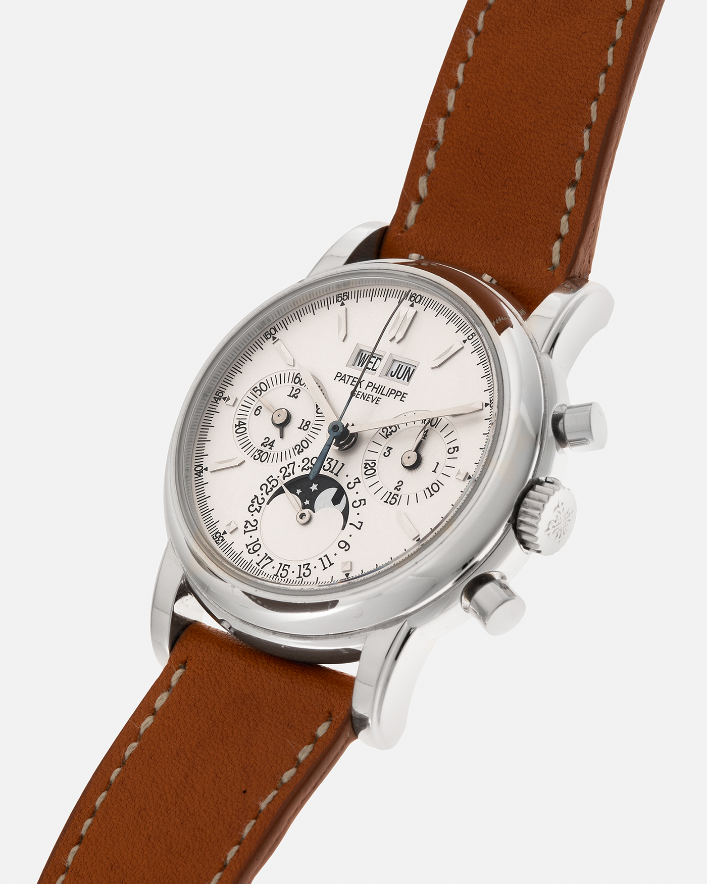 Brand: Patek Philippe
Year: 2004
Model: Perpetual Calendar Chronograph
Reference Number: 3970EP
Material: Platinum 950
Movement: Patek Philippe Cal. 27-70 Q (Based on Lemania Cal. 2310), Self-Winding
Movement Number: 3047XXX
Case Dimensions: 36mm x 13mm (43.3mm Lug-to-Lug)
Lug Width: 19mm
Strap: Wind Vintage Tanned Calfskin Leather Strap with Signed Platinum 950 Tang Buckle, with additional Patek Philippe Dark Brown Calf Leather Strap and Signed Platinum 950 Deployant Clasp