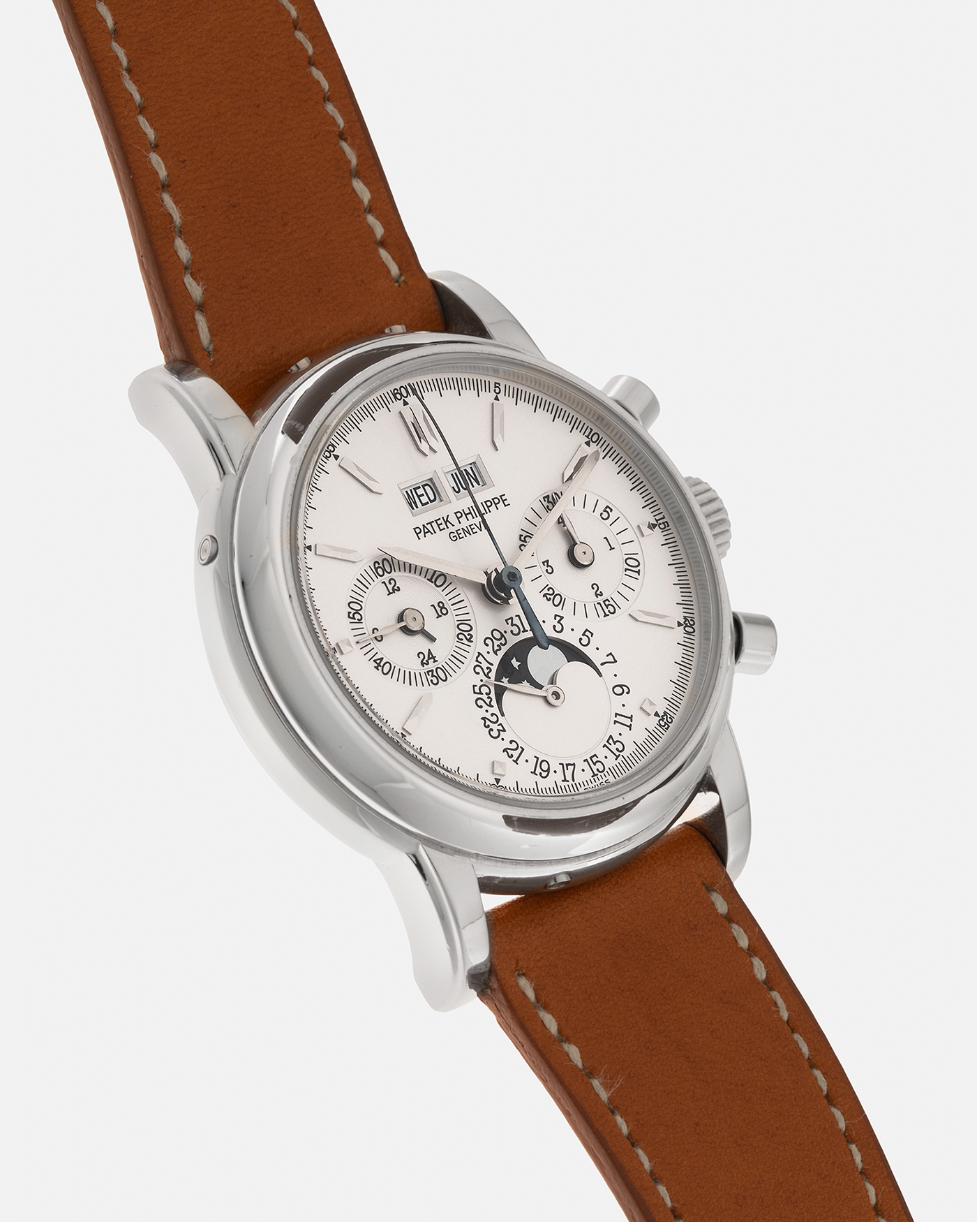 Brand: Patek Philippe
Year: 2004
Model: Perpetual Calendar Chronograph
Reference Number: 3970EP
Material: Platinum 950
Movement: Patek Philippe Cal. 27-70 Q (Based on Lemania Cal. 2310), Self-Winding
Movement Number: 3047XXX
Case Dimensions: 36mm x 13mm (43.3mm Lug-to-Lug)
Lug Width: 19mm
Strap: Wind Vintage Tanned Calfskin Leather Strap with Signed Platinum 950 Tang Buckle, with additional Patek Philippe Dark Brown Calf Leather Strap and Signed Platinum 950 Deployant Clasp