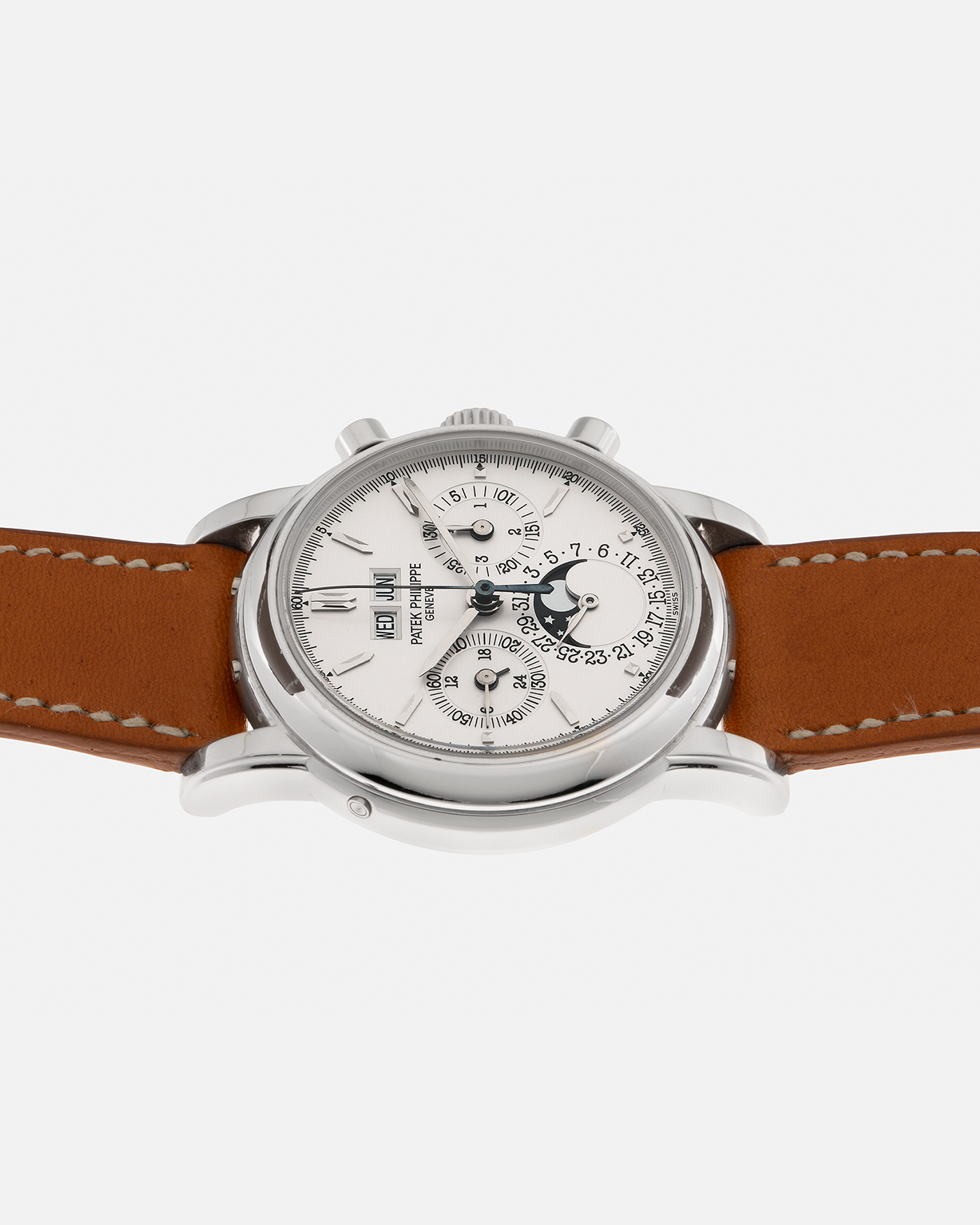 Brand: Patek Philippe
Year: 2004
Model: Perpetual Calendar Chronograph
Reference Number: 3970EP
Material: Platinum 950
Movement: Patek Philippe Cal. 27-70 Q (Based on Lemania Cal. 2310), Self-Winding
Movement Number: 3047XXX
Case Dimensions: 36mm x 13mm (43.3mm Lug-to-Lug)
Lug Width: 19mm
Strap: Wind Vintage Tanned Calfskin Leather Strap with Signed Platinum 950 Tang Buckle, with additional Patek Philippe Dark Brown Calf Leather Strap and Signed Platinum 950 Deployant Clasp
