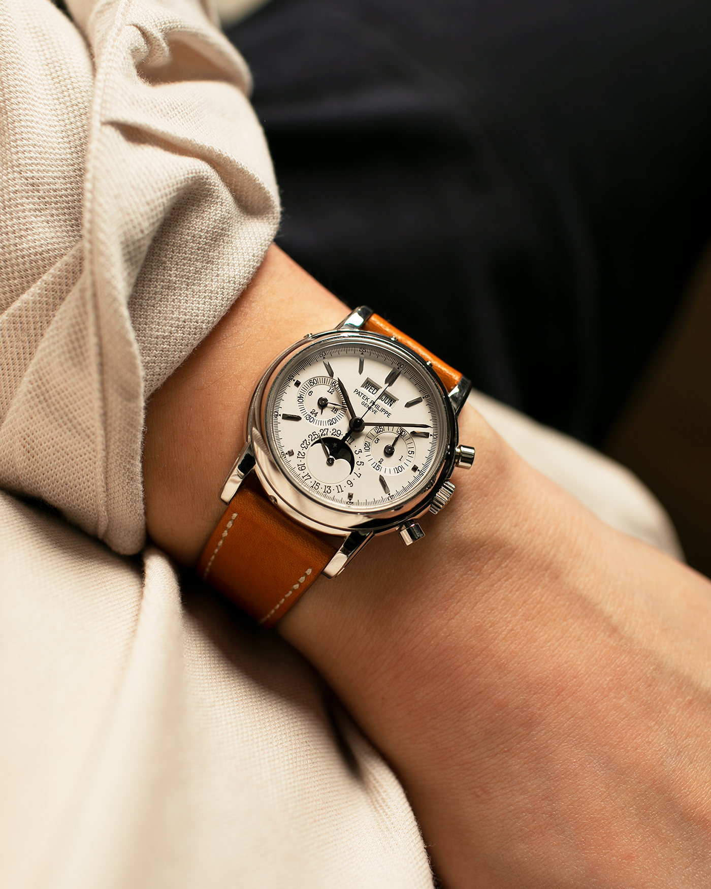 Brand: Patek Philippe
Year: 2004
Model: Perpetual Calendar Chronograph
Reference Number: 3970EP
Material: Platinum 950
Movement: Patek Philippe Cal. 27-70 Q (Based on Lemania Cal. 2310), Self-Winding
Movement Number: 3047XXX
Case Dimensions: 36mm x 13mm (43.3mm Lug-to-Lug)
Lug Width: 19mm
Strap: Wind Vintage Tanned Calfskin Leather Strap with Signed Platinum 950 Tang Buckle, with additional Patek Philippe Dark Brown Calf Leather Strap and Signed Platinum 950 Deployant Clasp