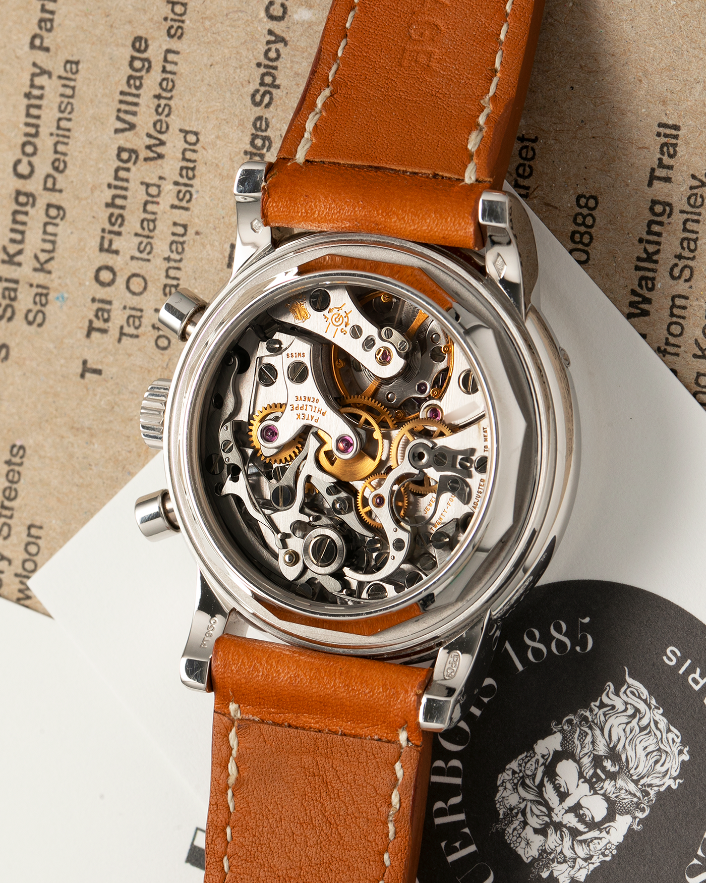 Brand: Patek Philippe
Year: 2004
Model: Perpetual Calendar Chronograph
Reference Number: 3970EP
Material: Platinum 950
Movement: Patek Philippe Cal. 27-70 Q (Based on Lemania Cal. 2310), Self-Winding
Movement Number: 3047XXX
Case Dimensions: 36mm x 13mm (43.3mm Lug-to-Lug)
Lug Width: 19mm
Strap: Wind Vintage Tanned Calfskin Leather Strap with Signed Platinum 950 Tang Buckle, with additional Patek Philippe Dark Brown Calf Leather Strap and Signed Platinum 950 Deployant Clasp
