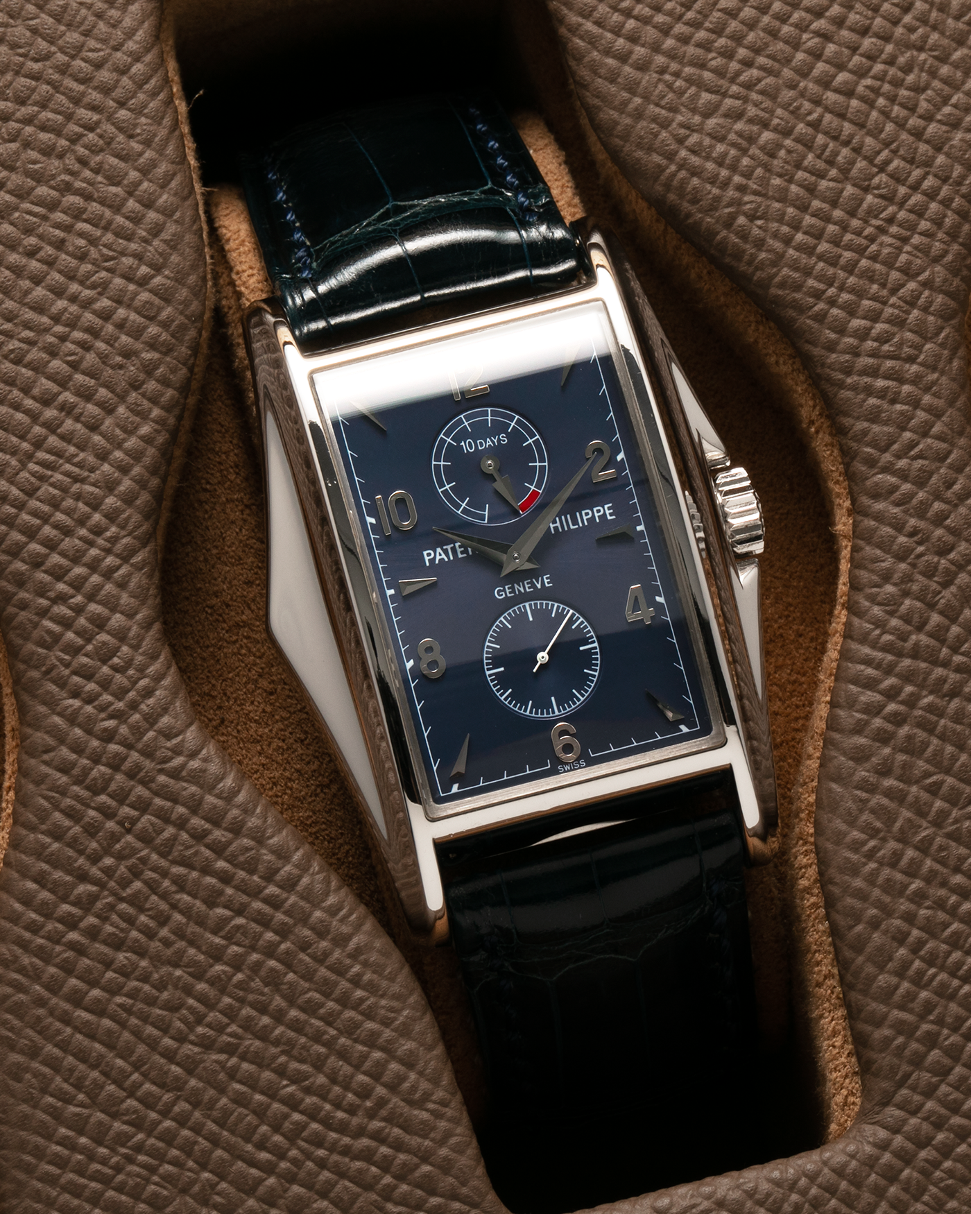 Brand: Patek Philippe Year: 2000 Model: Gondolo 10 Days, Limited Edition of 450 pieces in 18-carat White Gold Case / Blue Dial Reference Number: 5100G-001 Material: 18-carat White Gold  Movement: Patek Philippe Cal. 28-20/200 PS IRM, Manual-Winding Case Dimensions: 46mm x 34mm Lug Width: 20mm Strap: Patek Philippe Blue Alligator Strap with Signed 18-carat White Gold Tang Buckle