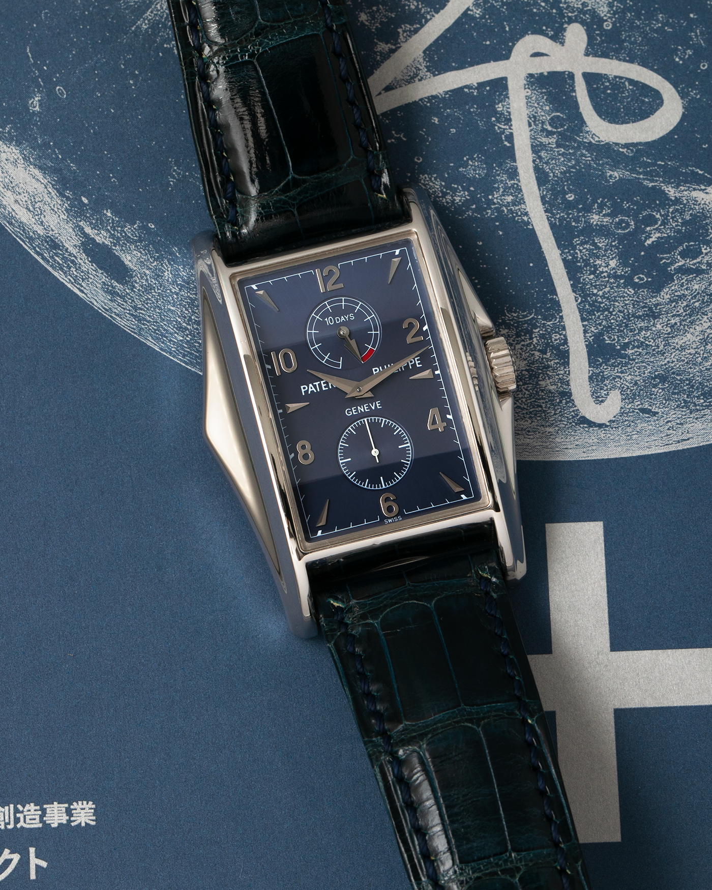 Brand: Patek Philippe Year: 2000 Model: Gondolo 10 Days, Limited Edition of 450 pieces in 18-carat White Gold Case / Blue Dial Reference Number: 5100G-001 Material: 18-carat White Gold  Movement: Patek Philippe Cal. 28-20/200 PS IRM, Manual-Winding Case Dimensions: 46mm x 34mm Lug Width: 20mm Strap: Patek Philippe Blue Alligator Strap with Signed 18-carat White Gold Tang Buckle