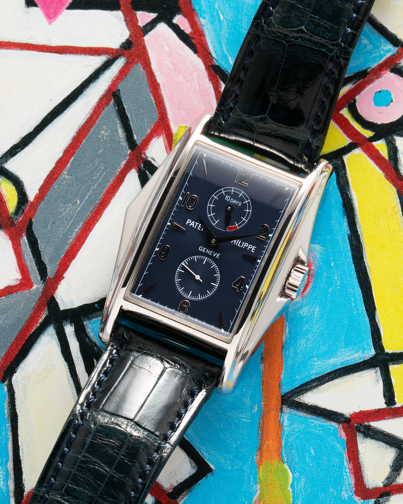 Brand: Patek Philippe Year: 2000 Model: Gondolo 10 Days, Limited Edition of 450 pieces in 18-carat White Gold Case / Blue Dial Reference Number: 5100G-001 Material: 18-carat White Gold  Movement: Patek Philippe Cal. 28-20/200 PS IRM, Manual-Winding Case Dimensions: 46mm x 34mm Lug Width: 20mm Strap: Patek Philippe Blue Alligator Strap with Signed 18-carat White Gold Tang Buckle
