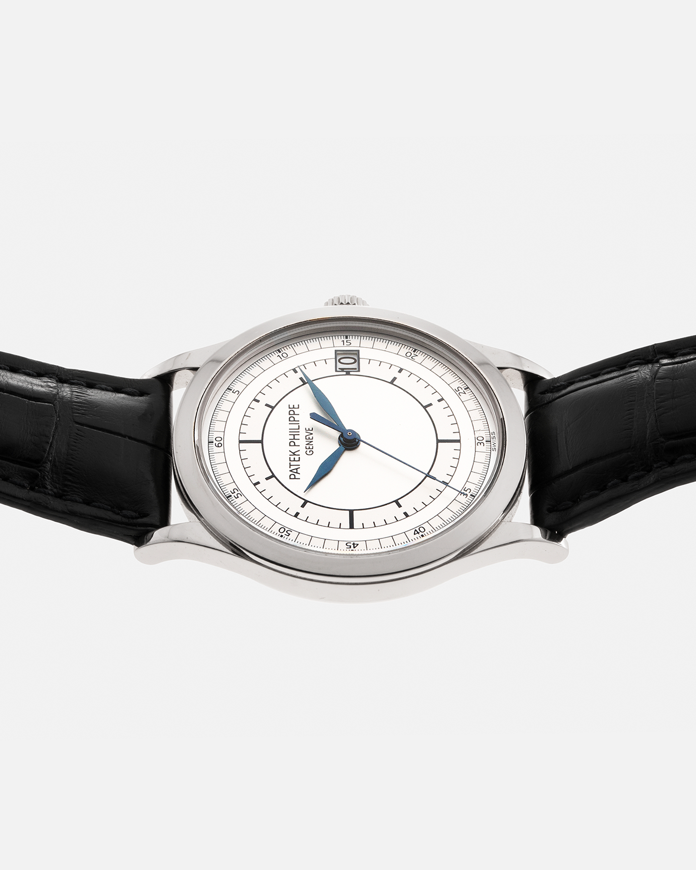 Brand: Patek Philippe Year: 2012 Model: Calatrava Reference: 5296G-001 Material: 18-carat White Gold Movement: Patek Philippe Cal. 324 S C, Self-Winding Case Diameter: 38mm Strap: Patek Philippe Dark Navy Alligator Strap with Signed 18-carat White Gold Tang Buckle