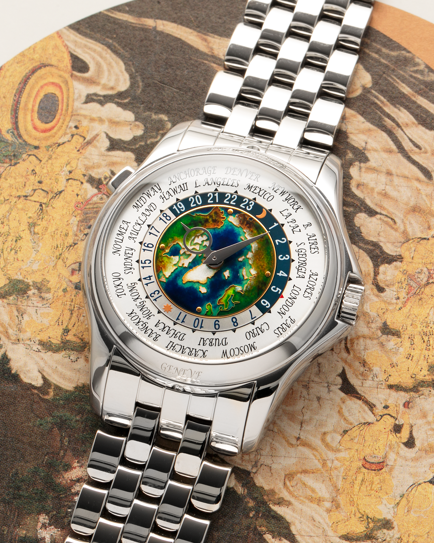 Brand: Patek Philippe
Year: 2021
Model: World Time ‘Cloisonné Enamel Dial’
Reference Number: 5131P
Material: Platinum 950
Movement: Patek Philippe Cal. 240 HU Micro Rotor, Self-Winding
Case Dimensions: 39.5mm x 10.6mm (48.5mm Lug-to-Lug)
Lug Width: 22mm
Bracelet: Patek Philippe Bracelet in Platinum 950 with Signed Integrated Double Deployant Folding Clasp
