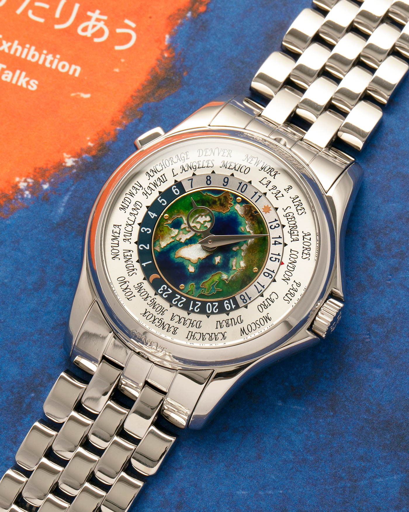Brand: Patek Philippe
Year: 2021
Model: World Time ‘Cloisonné Enamel Dial’
Reference Number: 5131P
Material: Platinum 950
Movement: Patek Philippe Cal. 240 HU Micro Rotor, Self-Winding
Movement Number: 734XXXX
Case Dimensions: 39.5mm x 10.6mm (48.5mm Lug-to-Lug)
Lug Width: 22mm
Bracelet: Patek Philippe C623BBP Bracelet in Platinum 950 with Signed Integrated Double Deployant Folding Clasp