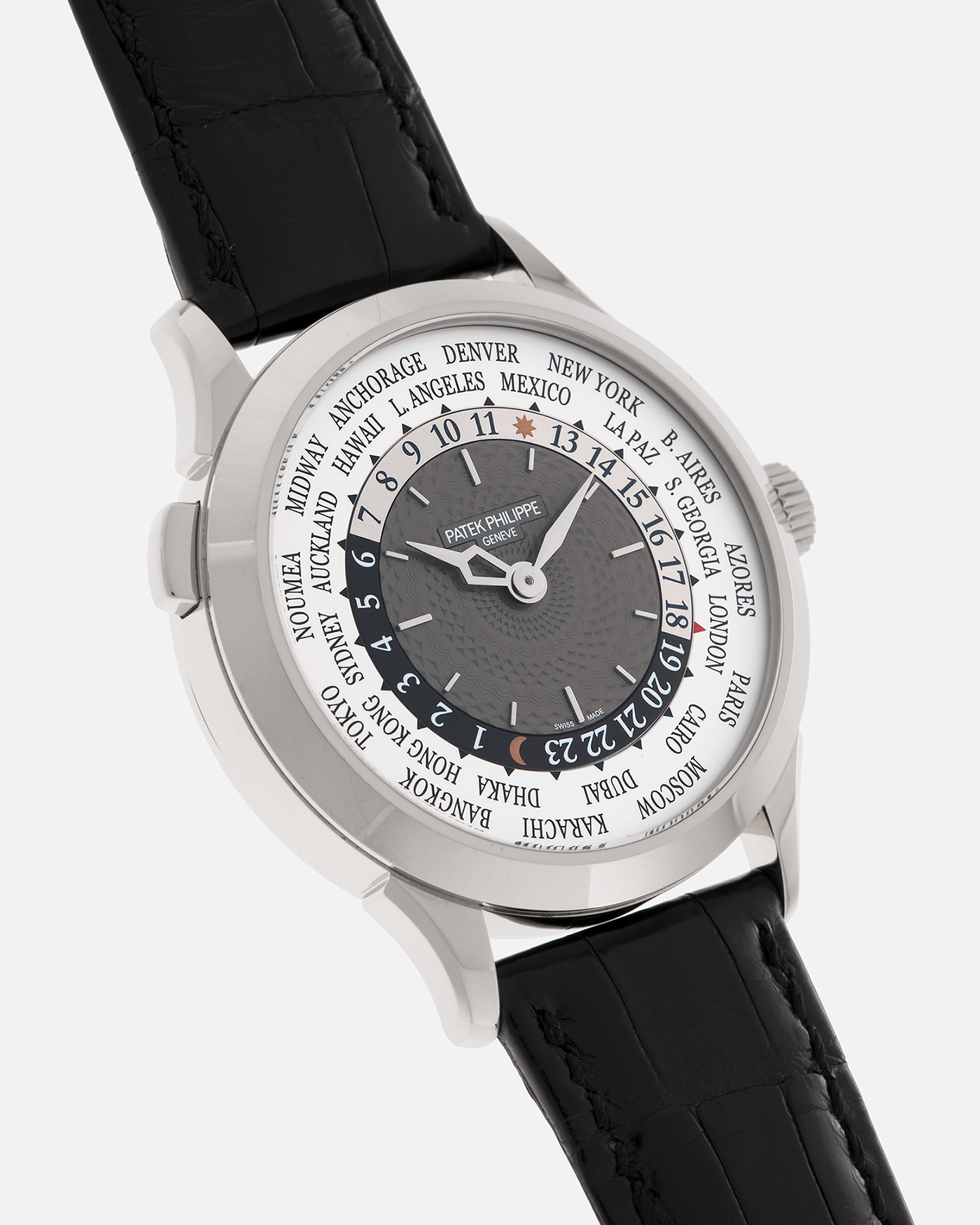 Brand: Patek Philippe
Year: 2018
Model: World Time
Reference: 5230G
Material: 18-carat White Gold
Movement: Patek Philippe Cal. 240 HU Micro Rotor, Self-Winding
Case Dimensions: 38.5mm x 10.3mm (Lug-to-Lug 47mm)
Lug Width: 20mm
Strap: Patek Philippe Black Alligator Leather Strap with Signed 18-carat White Gold Deployant Clasp