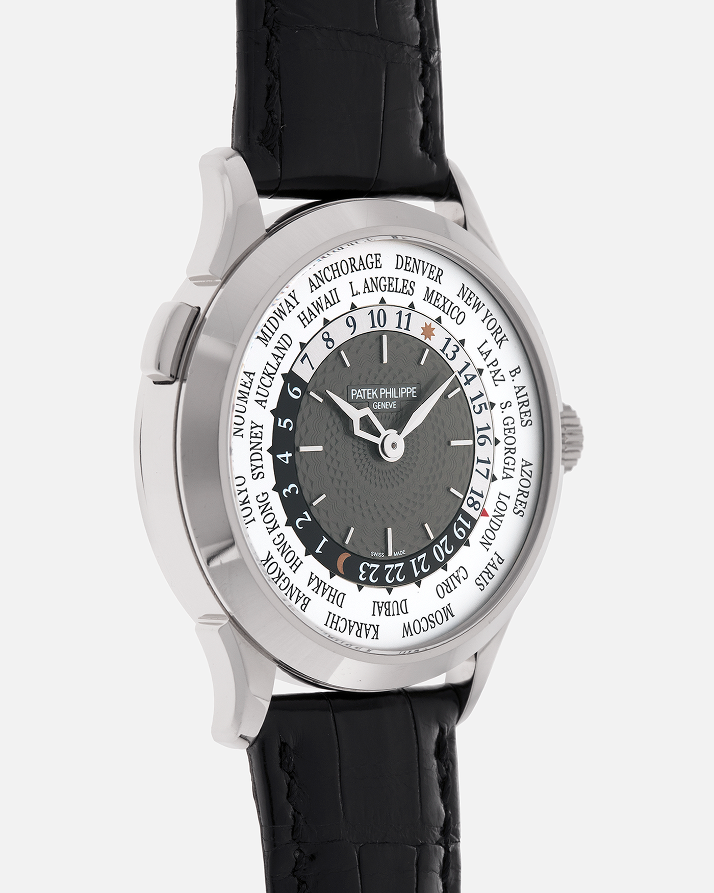 Brand: Patek Philippe
Year: 2018
Model: World Time
Reference: 5230G
Material: 18-carat White Gold
Movement: Patek Philippe Cal. 240 HU Micro Rotor, Self-Winding
Case Dimensions: 38.5mm x 10.3mm (Lug-to-Lug 47mm)
Lug Width: 20mm
Strap: Patek Philippe Black Alligator Leather Strap with Signed 18-carat White Gold Deployant Clasp
