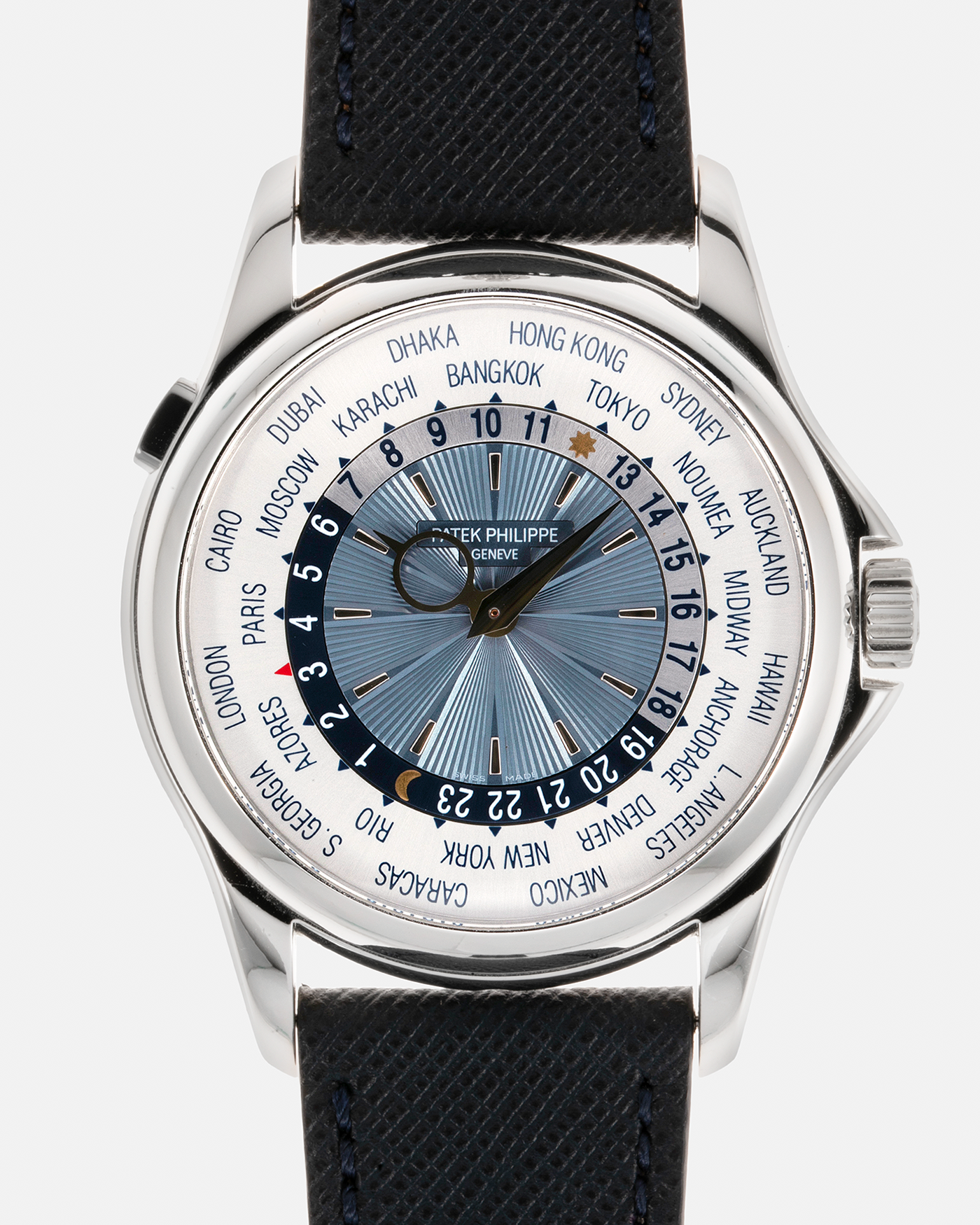 Brand: Patek Philippe Year: 2010s Model: World Time Reference Number: 5130P Material: Platinum 950 Movement: Patek Philippe Cal. 240 HU Micro-Rotor, Self-Winding Case Diameter: 39.5mm Lug Width: 21mm Bracelet: Molequin Oxford Blue Textured Calf Leather Strap with Signed Platinum 950 Deployant Clasp