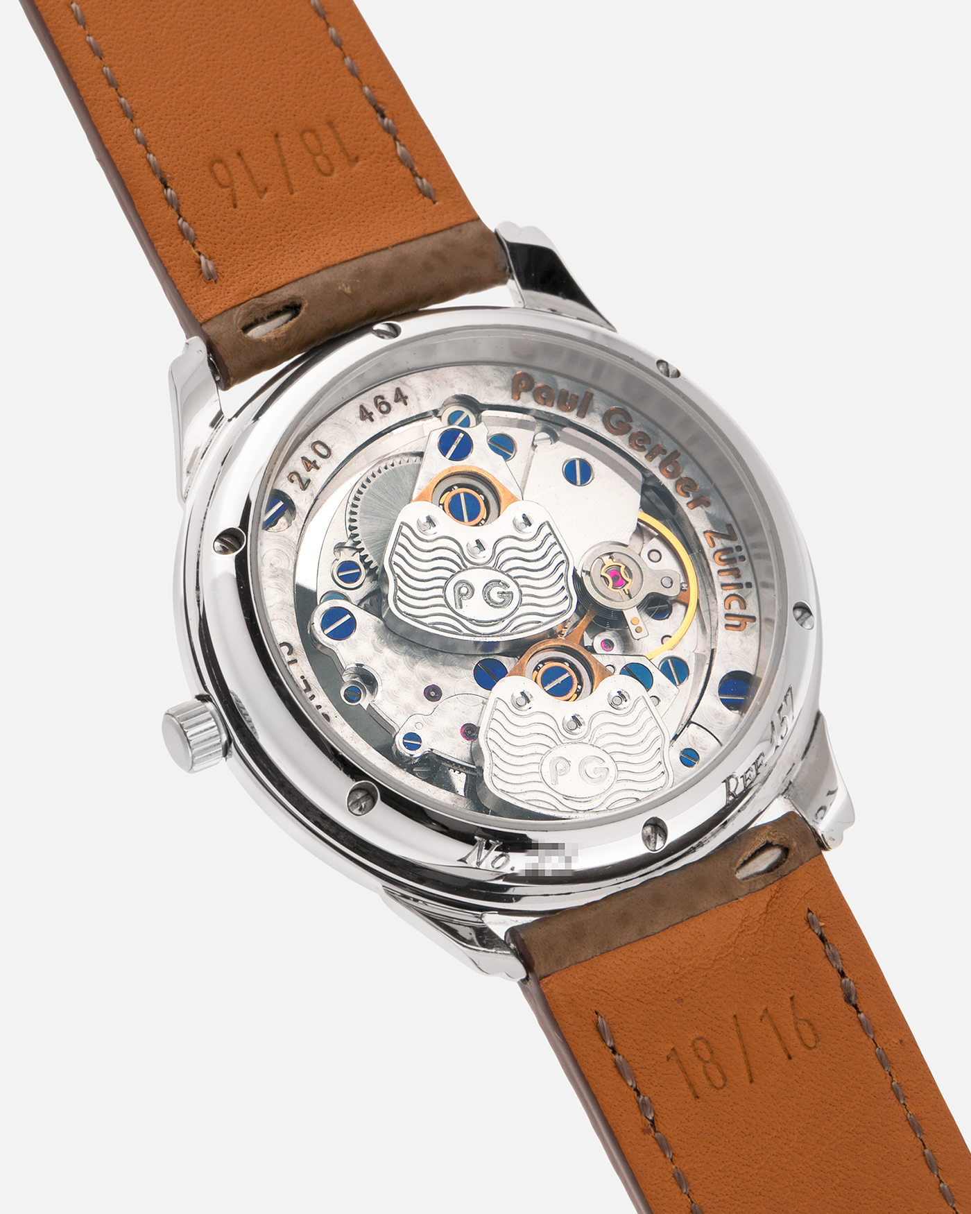 Brand: Paul Gerber
Year: 2000’s
Model: Retro Twin
Reference: 157
Material: 18-carat White Gold
Movement: Self-Winding Paul Gerber Cal. 15 (Heavily-Modified Peseux Cal. 7001)
Case Dimensions: 36mm Diameter 11mm Thickness
Lug Width: 18mm
Strap: Paul Gerber Dark Brown Calf Leather Strap with Signed 18-carat Yellow Gold Tang Buckle
