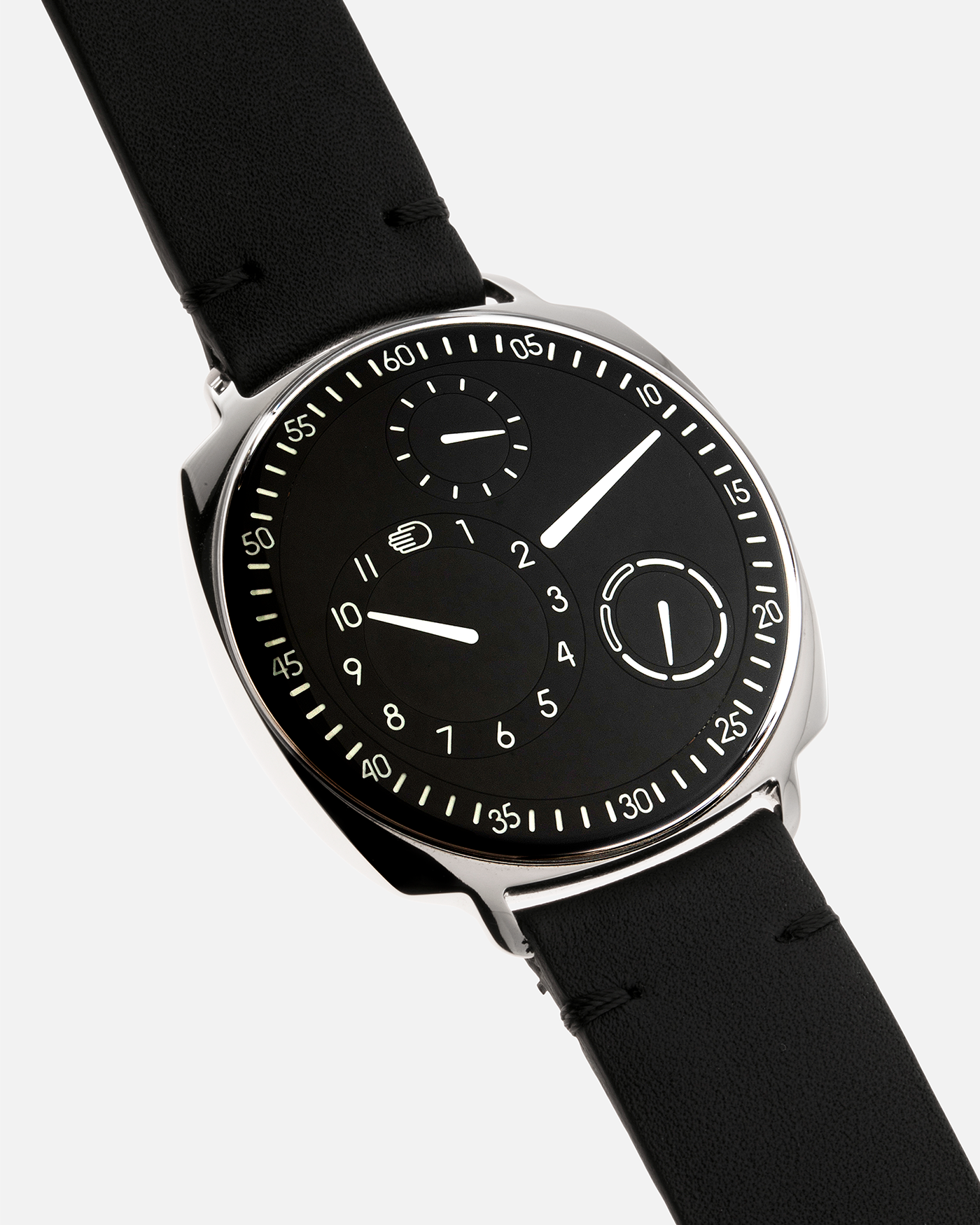 Brand: Ressence Year: 2022 Model: Type 1² Black Material: Polished Grade 5 Titanium with Satin Finished Caseback Movement: Customised ETA Cal. 2894/2 Base with In-House Patented Ressence Orbital Convex System (ROCS) 1 Module Driven by Minute Axle, Self-Winding Case Dimensions: 42mm Bracelet/Strap: Ressence Black Calf Leather Strap with Signed Ardillon Buckle