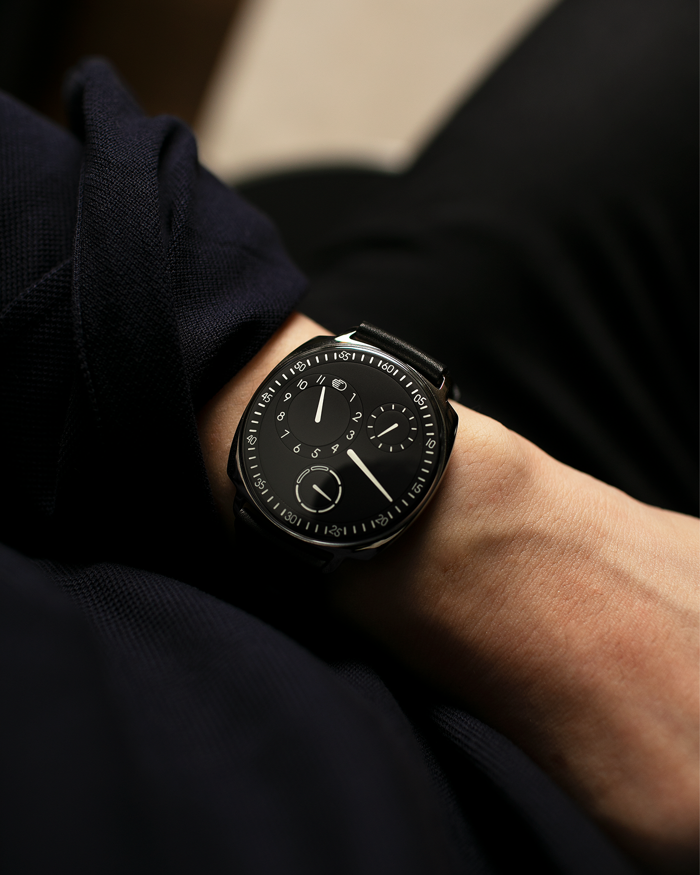 Brand: Ressence Year: 2022 Model: Type 1² Black Material: Polished Grade 5 Titanium with Satin Finished Caseback Movement: Customised ETA Cal. 2894/2 Base with In-House Patented Ressence Orbital Convex System (ROCS) 1 Module Driven by Minute Axle, Self-Winding Case Dimensions: 42mm Bracelet/Strap: Ressence Black Calf Leather Strap with Signed Ardillon Buckle