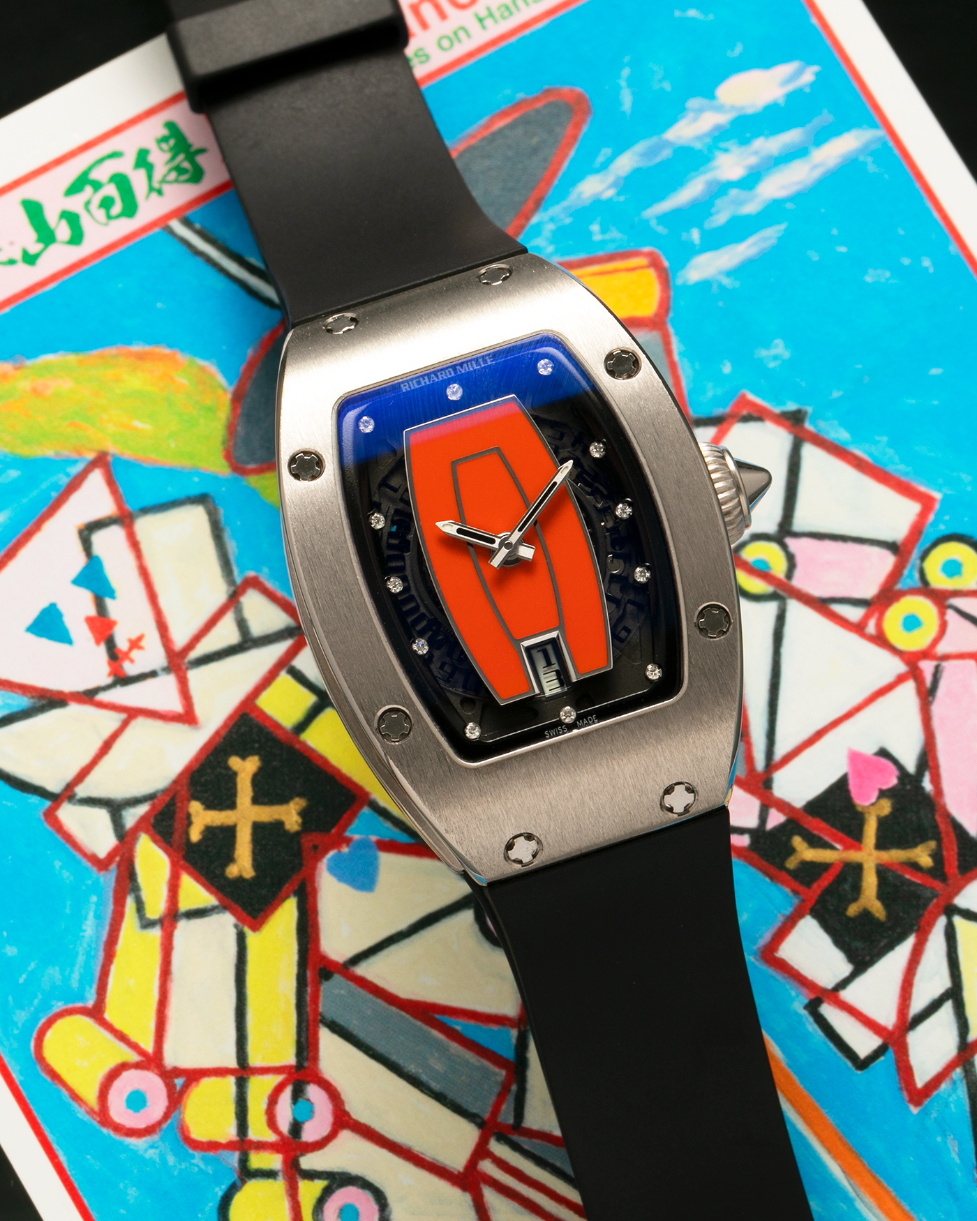 Brand: Richard Mille Year: 2000s Model: RM007 ‘Orange Lip’ Case Material: 18-carat White Gold Case, Diamond-Set Hour Markers Movement: Richard Mille Cal. RM007, Self-Winding Case Dimensions: 31mm x 45mm  Strap: Richard Mille Black Rubber Strap with Signed Titanium Deployant Clasp