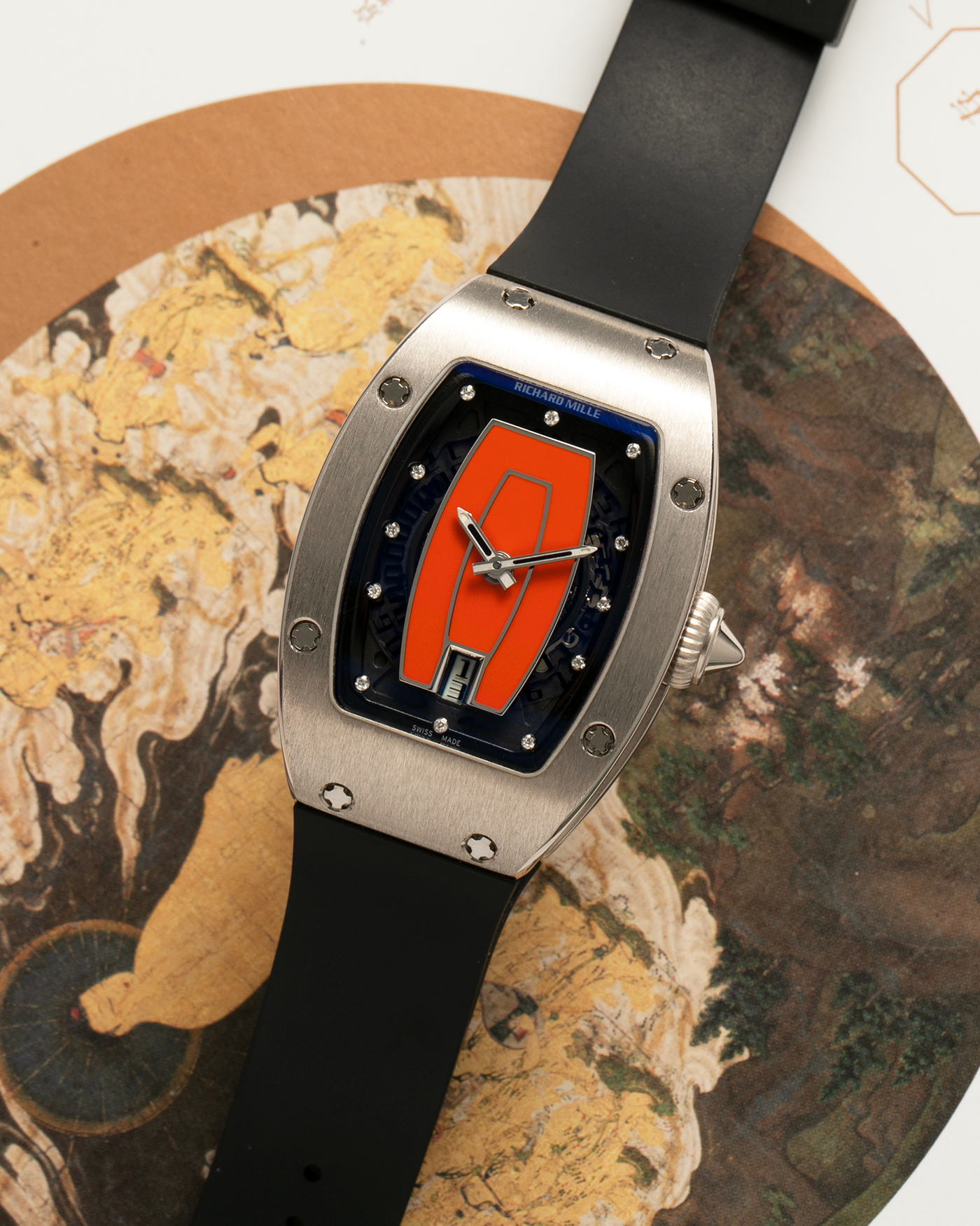 Brand: Richard Mille Year: 2000s Model: RM007 ‘Orange Lip’ Case Material: 18-carat White Gold Case, Diamond-Set Hour Markers Movement: Richard Mille Cal. RM007, Self-Winding Case Dimensions: 31mm x 45mm  Strap: Richard Mille Black Rubber Strap with Signed Titanium Deployant Clasp