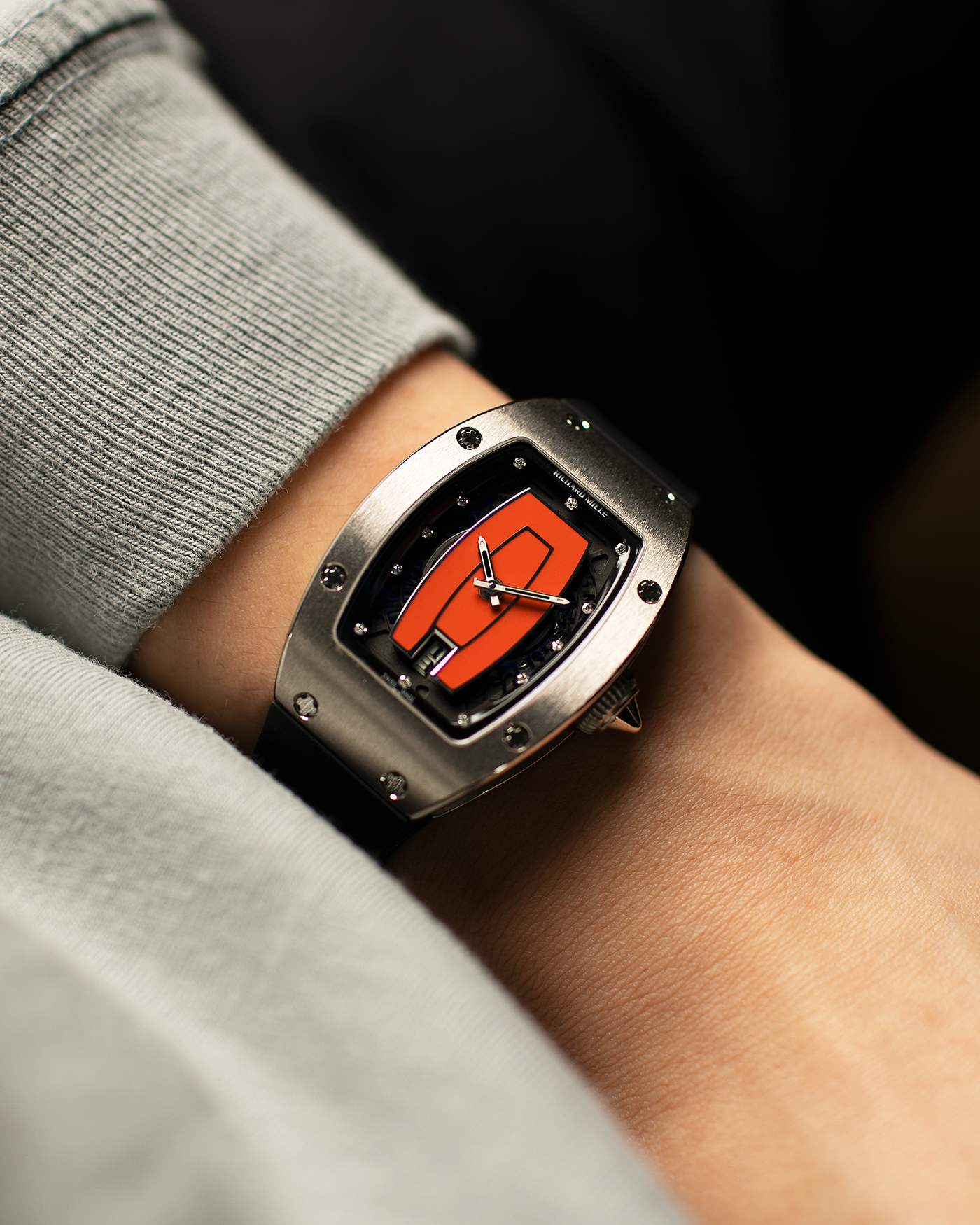 Brand: Richard Mille Year: 2000s Model: RM007 ‘Orange Lip’ Case Material: 18-carat White Gold Case, Diamond-Set Hour Markers Movement: Richard Mille Cal. RM007, Self-Winding Case Dimensions: 31mm x 45mm  Strap: Richard Mille Black Rubber Strap with Signed Titanium Deployant Clasp
