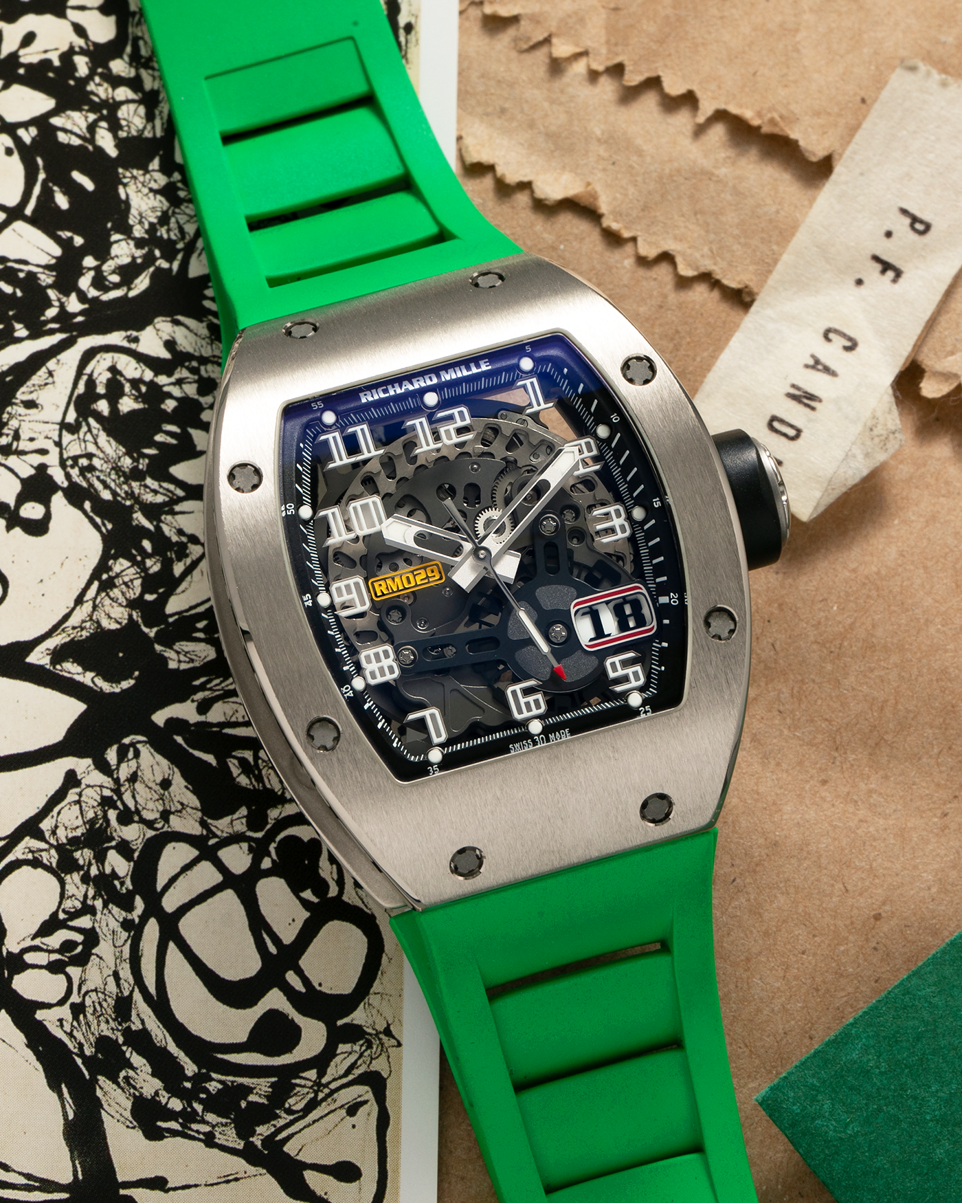 Brand: Richard Mille Year: 2014 Model: RM029 Case Material: 18-carat White Gold Movement: Richard Mille Cal. RMAS7, Self-Winding Case Dimensions: 39.7mm x 48mm  Strap: Richard Mille Green Rubber Strap with Signed Titanium Deployant Clasp, with two additional White and Black Richard Mille Rubber Straps