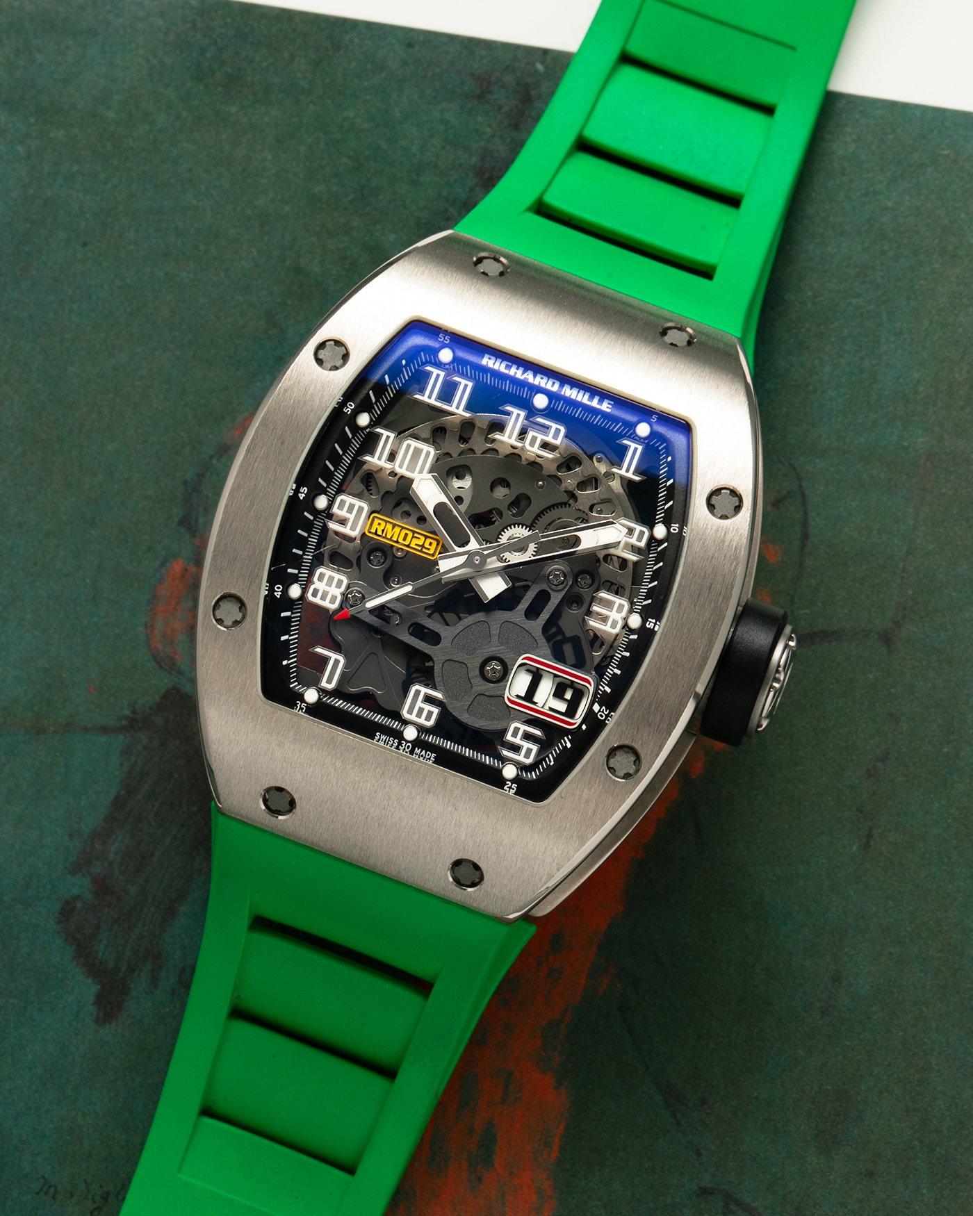 Brand: Richard Mille Year: 2014 Model: RM029 Case Material: 18-carat White Gold Movement: Richard Mille Cal. RMAS7, Self-Winding Case Dimensions: 39.7mm x 48mm  Strap: Richard Mille Green Rubber Strap with Signed Titanium Deployant Clasp, with two additional White and Black Richard Mille Rubber Straps