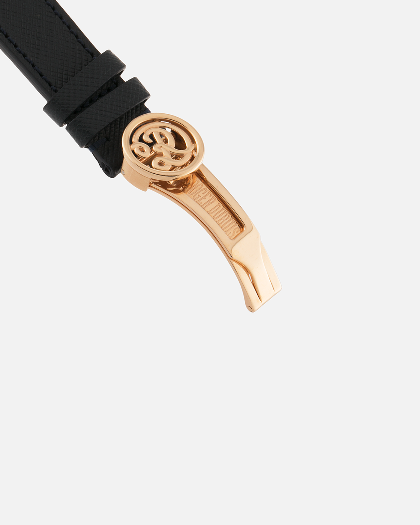 Brand: Roger Dubuis
Year: 2000
Model: Sympathie 37 2000 New Millenary
Material: 18k Rose Gold
Movement: Roger Dubuis Cal. 5740
Case Dimensions: 34mm Diameter 11mm Thickness
Lug Width: 18mm
Strap: Molequin Navy Blue Textured Calf Leather Strap with Signed 18k Rose Gold Tang Buckle