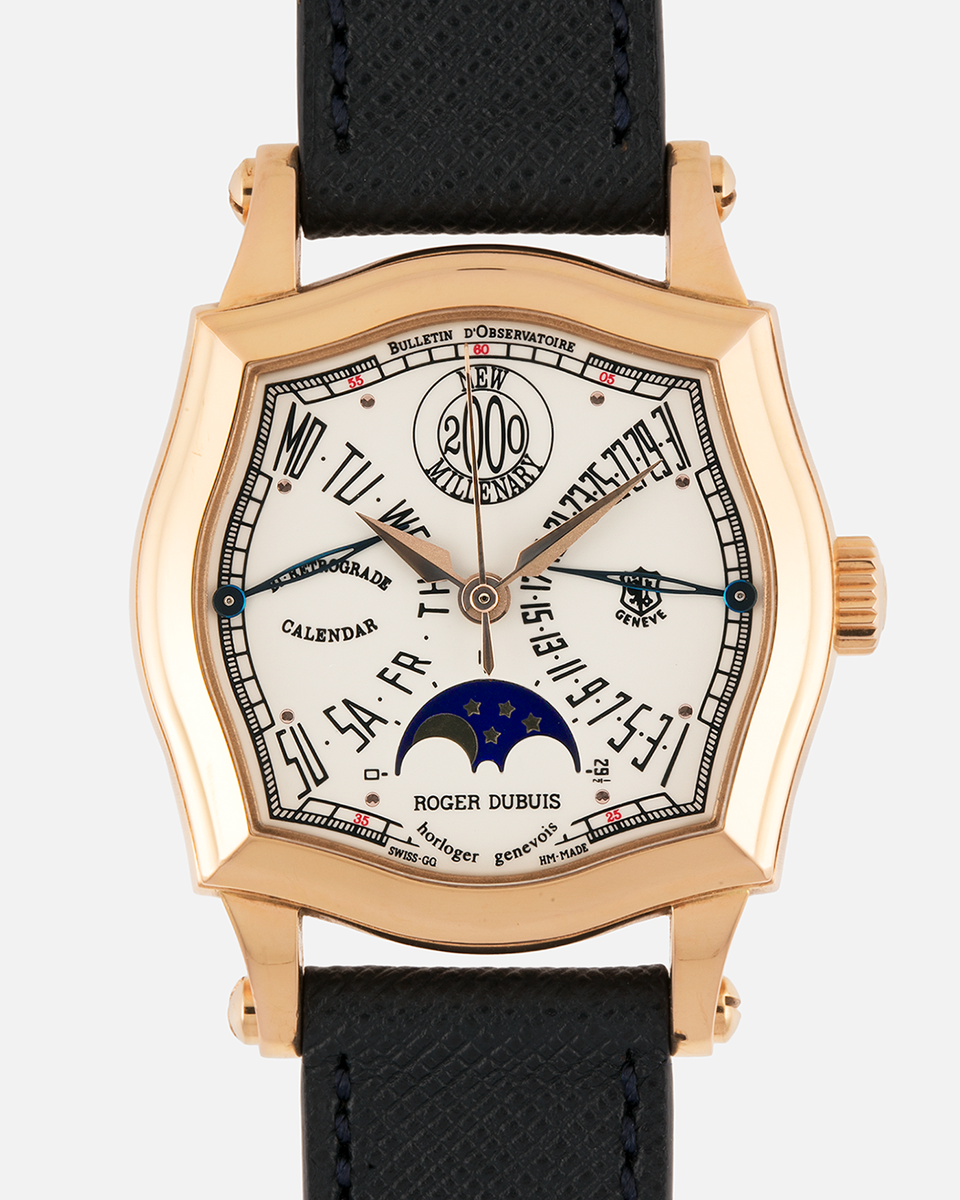 Brand: Roger Dubuis
Year: 2000
Model: Sympathie 37 2000 New Millenary
Material: 18k Rose Gold
Movement: Roger Dubuis Cal. 5740
Case Dimensions: 34mm Diameter 11mm Thickness
Lug Width: 18mm
Strap: Molequin Navy Blue Textured Calf Leather Strap with Signed 18k Rose Gold Tang Buckle