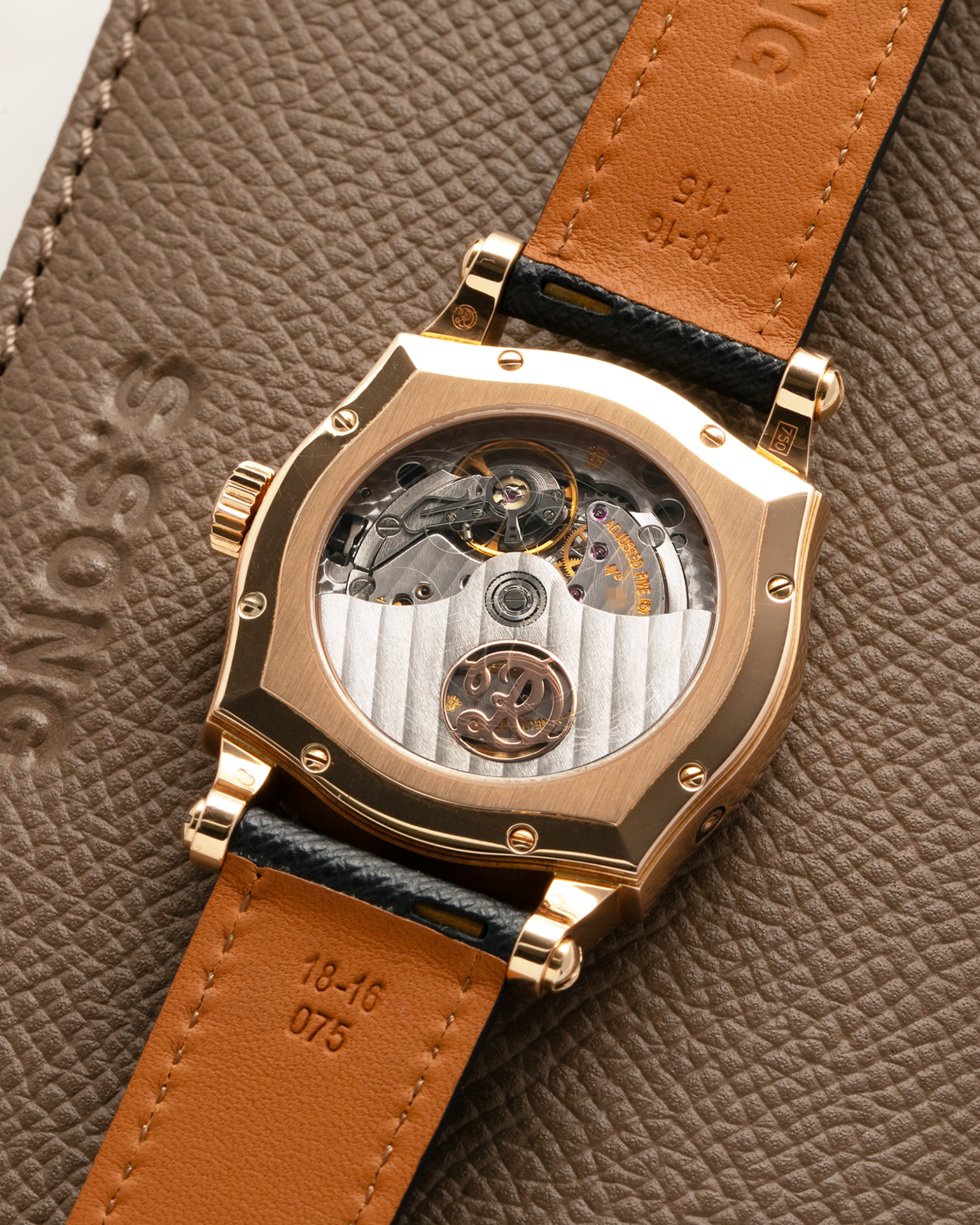 Brand: Roger Dubuis
Year: 2000
Model: Sympathie 37 2000 New Millenary
Material: 18k Rose Gold
Movement: Roger Dubuis Cal. 5740
Case Dimensions: 34mm Diameter 11mm Thickness
Lug Width: 18mm
Strap: Molequin Navy Blue Textured Calf Leather Strap with Signed 18k Rose Gold Tang Buckle