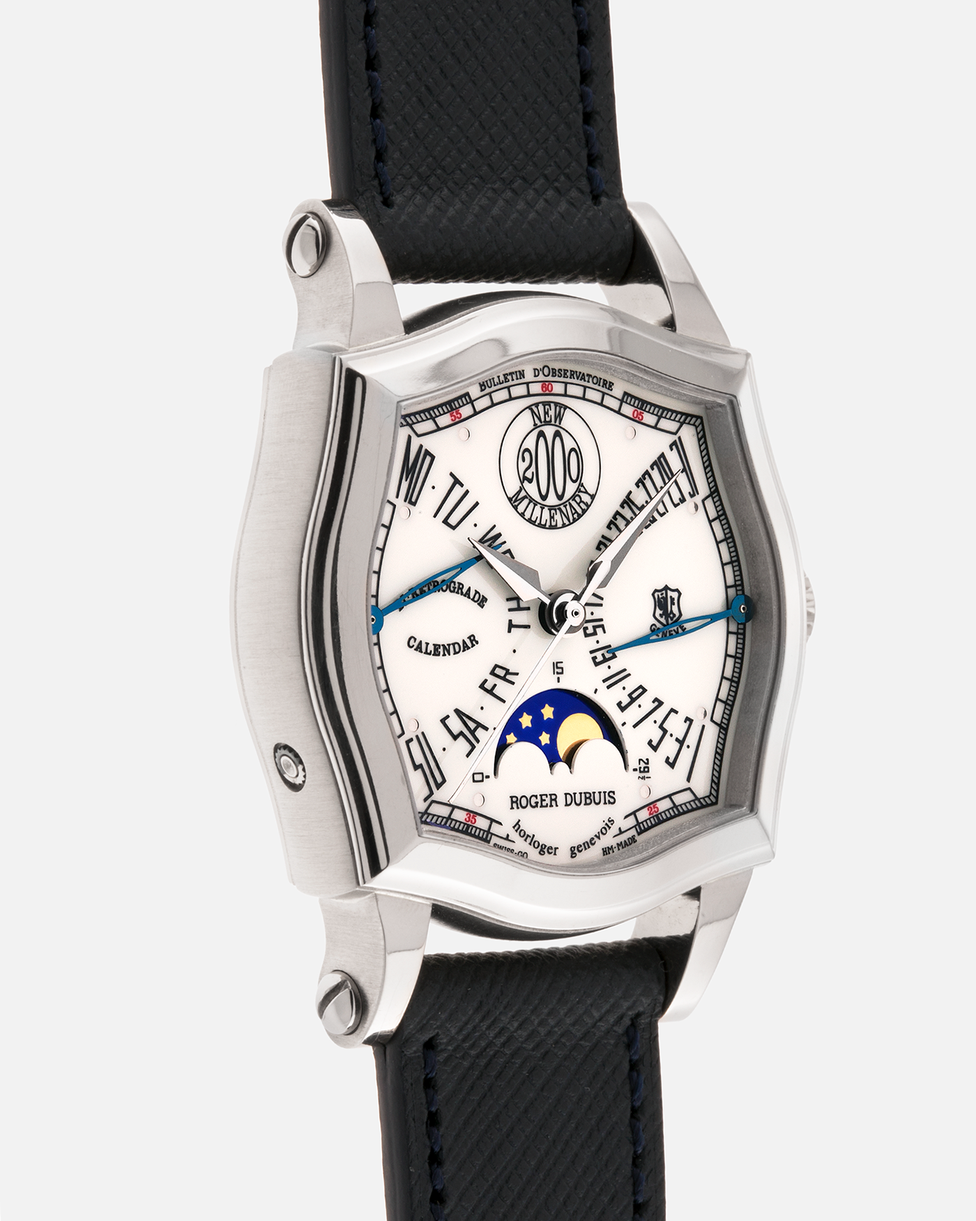 Brand: Roger Dubuis
Year: 2000
Model: Sympathie 37 Bi-retrograde Calendar 2000 New Millenary
Material: 18-carat White Gold
Movement: Roger Dubuis Cal. 5840
Case Dimensions: 34mm Diameter, 11mm Thickness
Lug Width: 18mm
Strap: Molequin Navy Blue Textured Calf Leather Strap with Signed 18-carat White Gold Tang Buckle