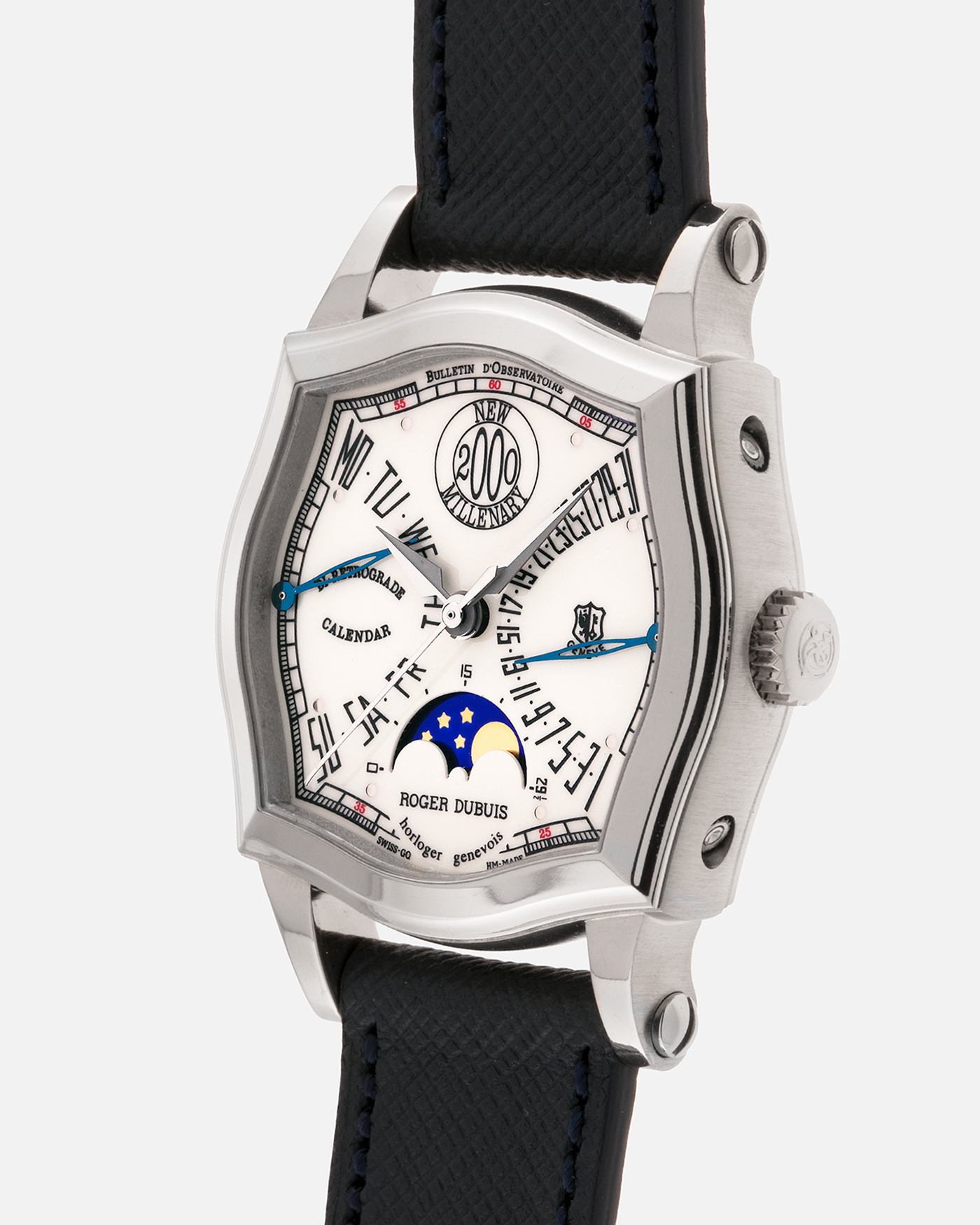 Brand: Roger Dubuis
Year: 2000
Model: Sympathie 37 Bi-retrograde Calendar 2000 New Millenary
Material: 18-carat White Gold
Movement: Roger Dubuis Cal. 5840
Case Dimensions: 34mm Diameter, 11mm Thickness
Lug Width: 18mm
Strap: Molequin Navy Blue Textured Calf Leather Strap with Signed 18-carat White Gold Tang Buckle