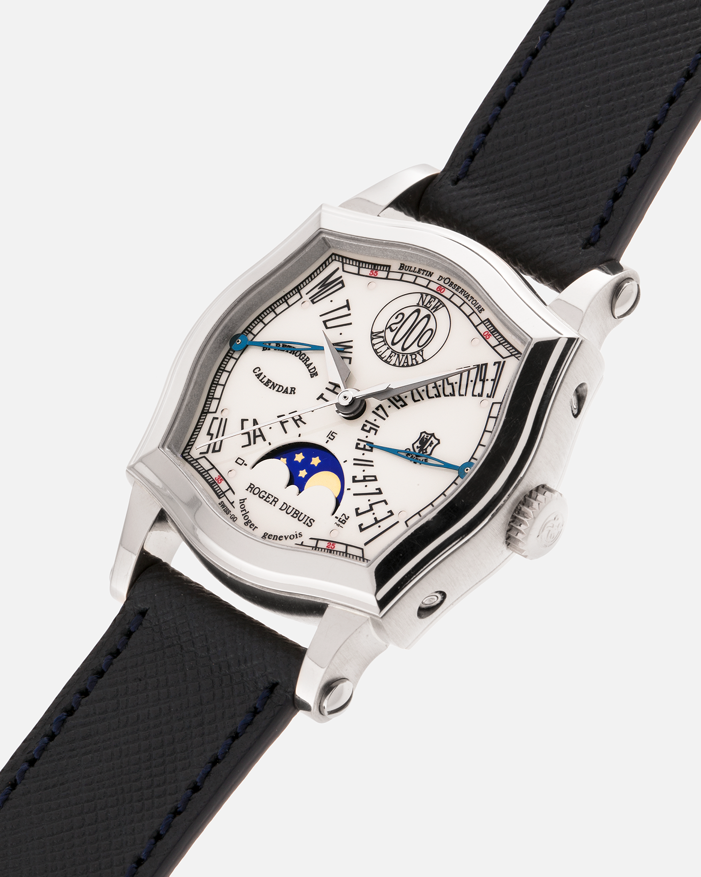 Brand: Roger Dubuis
Year: 2000
Model: Sympathie 37 Bi-retrograde Calendar 2000 New Millenary
Material: 18-carat White Gold
Movement: Roger Dubuis Cal. 5840
Case Dimensions: 34mm Diameter, 11mm Thickness
Lug Width: 18mm
Strap: Molequin Navy Blue Textured Calf Leather Strap with Signed 18-carat White Gold Tang Buckle