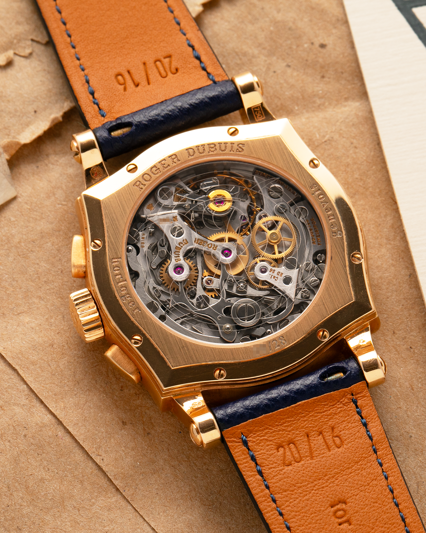 Brand: Roger Dubuis
Year: Late 1990’s/2000’s
Model: Sympathie 37 Perpetual Chronograph
Material: 18k Rose Gold
Movement: Cal RD56 / Lemania 2310
Case Diameter: 37mm
Strap: Nostime Blue Textured Calf Strap and Roger Dubuis 18k Rose Gold Tang Buckle