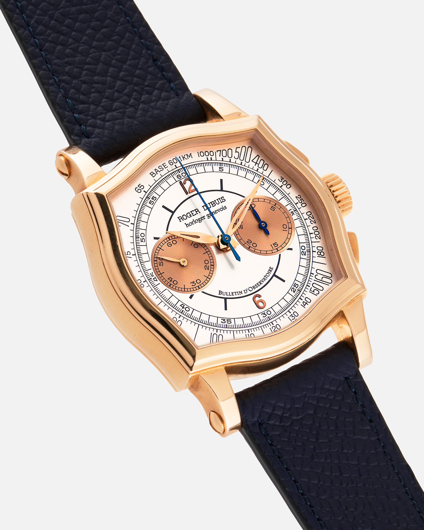 Brand: Roger Dubuis
Year: Late 1990’s/2000’s
Model: Sympathie 37 Perpetual Chronograph
Material: 18k Rose Gold
Movement: Cal RD56 / Lemania 2310
Case Diameter: 37mm
Strap: Nostime Blue Textured Calf Strap and Roger Dubuis 18k Rose Gold Tang Buckle