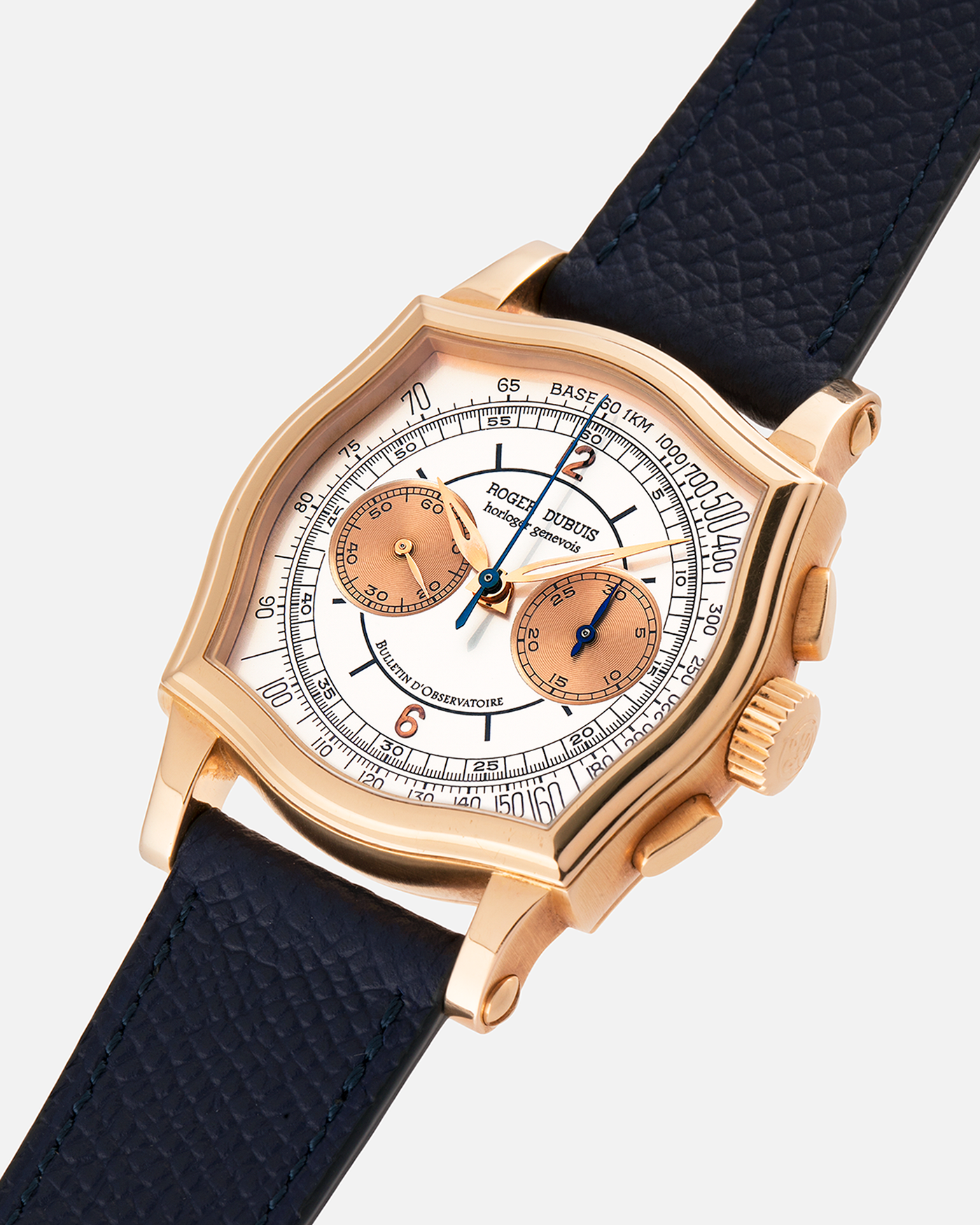 Brand: Roger Dubuis
Year: Late 1990’s/2000’s
Model: Sympathie 37 Perpetual Chronograph
Material: 18k Rose Gold
Movement: Cal RD56 / Lemania 2310
Case Diameter: 37mm
Strap: Nostime Blue Textured Calf Strap and Roger Dubuis 18k Rose Gold Tang Buckle