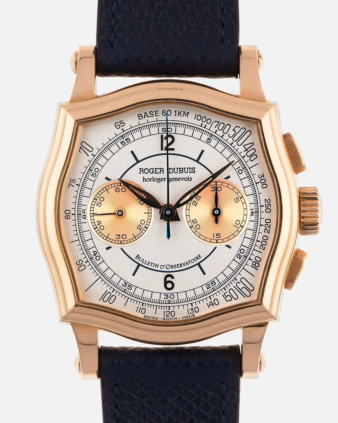 Brand: Roger Dubuis
Year: Late 1990’s/2000’s
Model: Sympathie 37 Perpetual Chronograph
Material: 18k Rose Gold
Movement: Cal RD56 / Lemania 2310
Case Diameter: 37mm
Strap: Nostime Blue Textured Calf Strap and Roger Dubuis 18k Rose Gold Tang Buckle