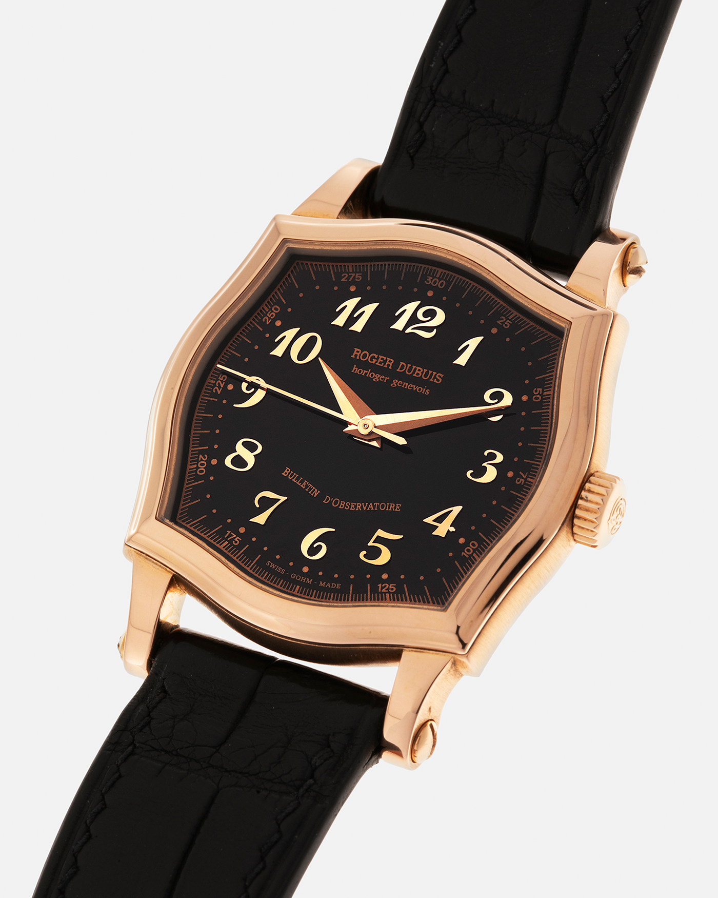 Brand: Roger Dubuis
Year: 2000s
Model: Sympathie 37 ‘Breguet Numerals’, Limited to 28 Pieces
Reference: S37.57.5
Material: 18-carat Rose Gold
Movement: Roger Dubuis Cal. RD 57, Self-Winding
Case Dimensions: 37mm x 8.5mm (Lug-to-Lug 46.5mm)
Lug Width: 20mm
Strap: Generic Unnamed Black Calf Leather Strap with Signed 18-carat Rose Gold Tang Buckle