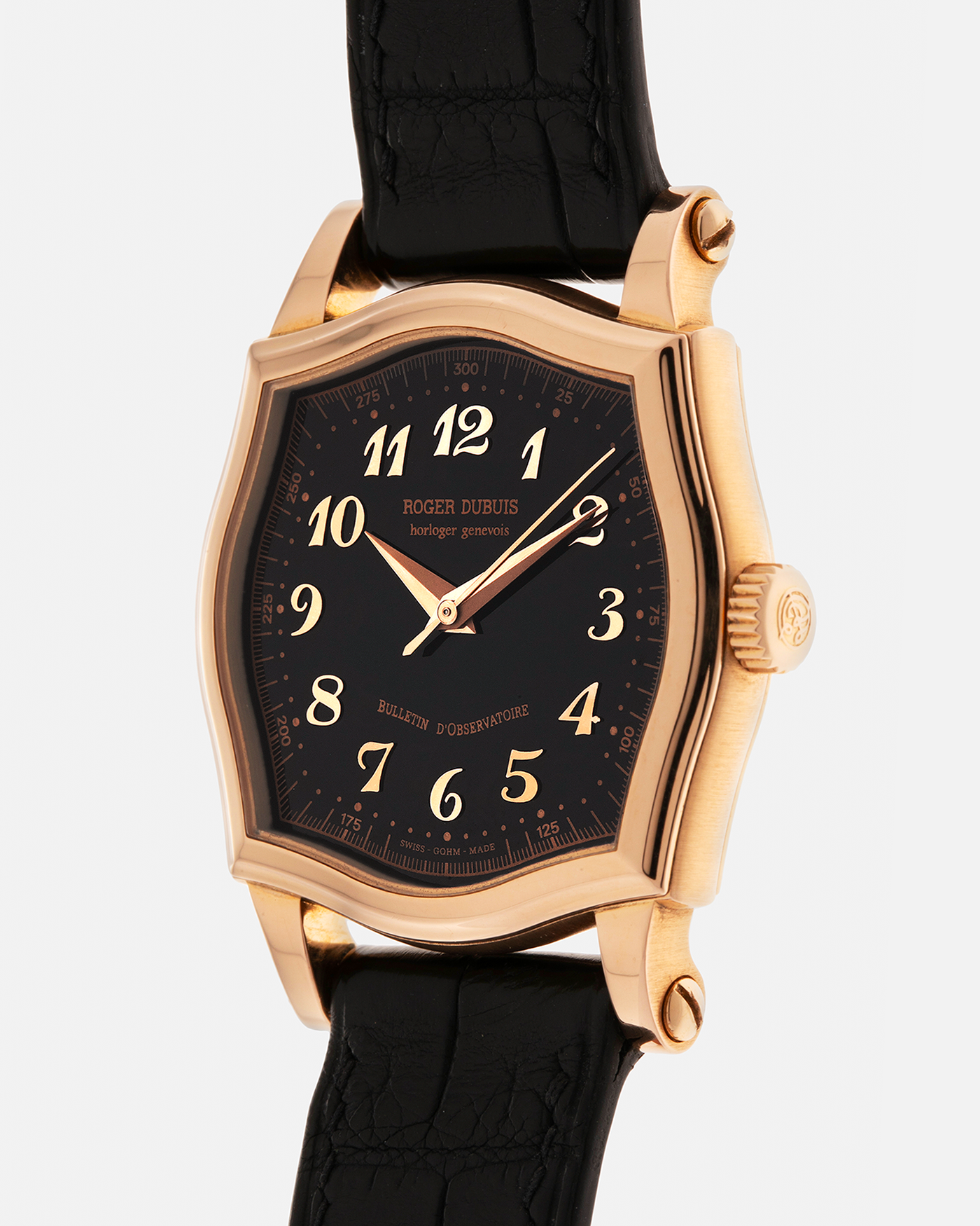 Brand: Roger Dubuis
Year: 2000s
Model: Sympathie 37 ‘Breguet Numerals’, Limited to 28 Pieces
Reference: S37.57.5
Material: 18-carat Rose Gold
Movement: Roger Dubuis Cal. RD 57, Self-Winding
Case Dimensions: 37mm x 8.5mm (Lug-to-Lug 46.5mm)
Lug Width: 20mm
Strap: Generic Unnamed Black Calf Leather Strap with Signed 18-carat Rose Gold Tang Buckle