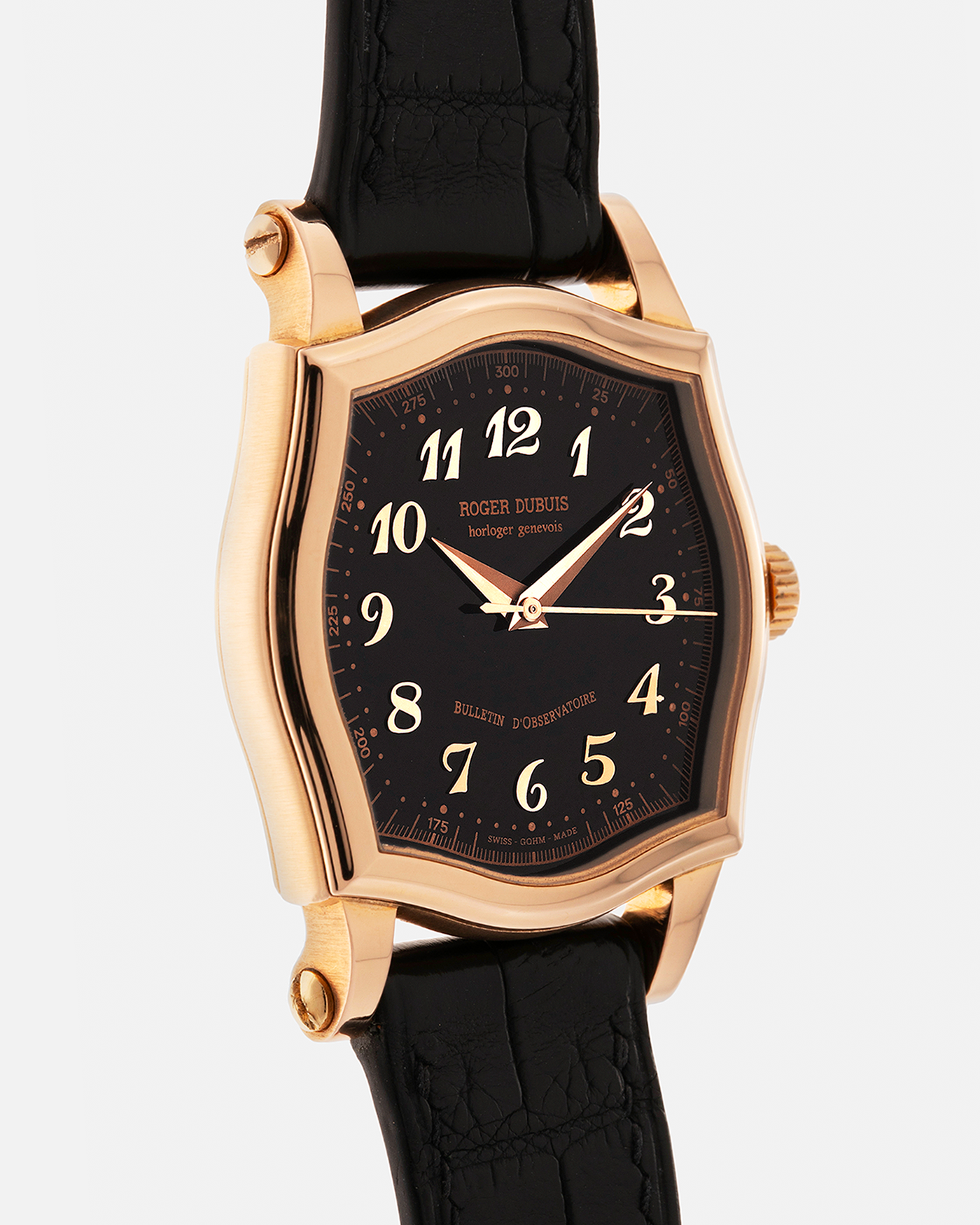 Brand: Roger Dubuis
Year: 2000s
Model: Sympathie 37 ‘Breguet Numerals’, Limited to 28 Pieces
Reference: S37.57.5
Material: 18-carat Rose Gold
Movement: Roger Dubuis Cal. RD 57, Self-Winding
Case Dimensions: 37mm x 8.5mm (Lug-to-Lug 46.5mm)
Lug Width: 20mm
Strap: Generic Unnamed Black Calf Leather Strap with Signed 18-carat Rose Gold Tang Buckle