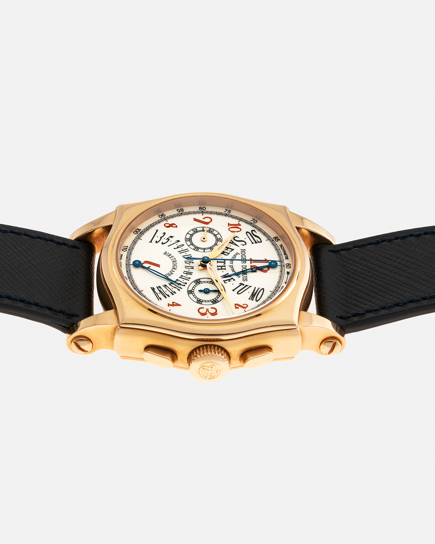 Brand: Roger Dubuis Year: 2000’s Model: Sympathie 40 Biretrograde Chronograph Material: 18-carat Yellow Gold Movement: Roger Dubuis Cal. RD 5630 (Based on the Lemania Cal. 2310), Manual-Winding Case Diameter: 40mm Strap: Molequin Navy Blue Textured Calf Leather Strap with Signed 18-carat Yellow Gold Roger Dubuis Tang Buckle