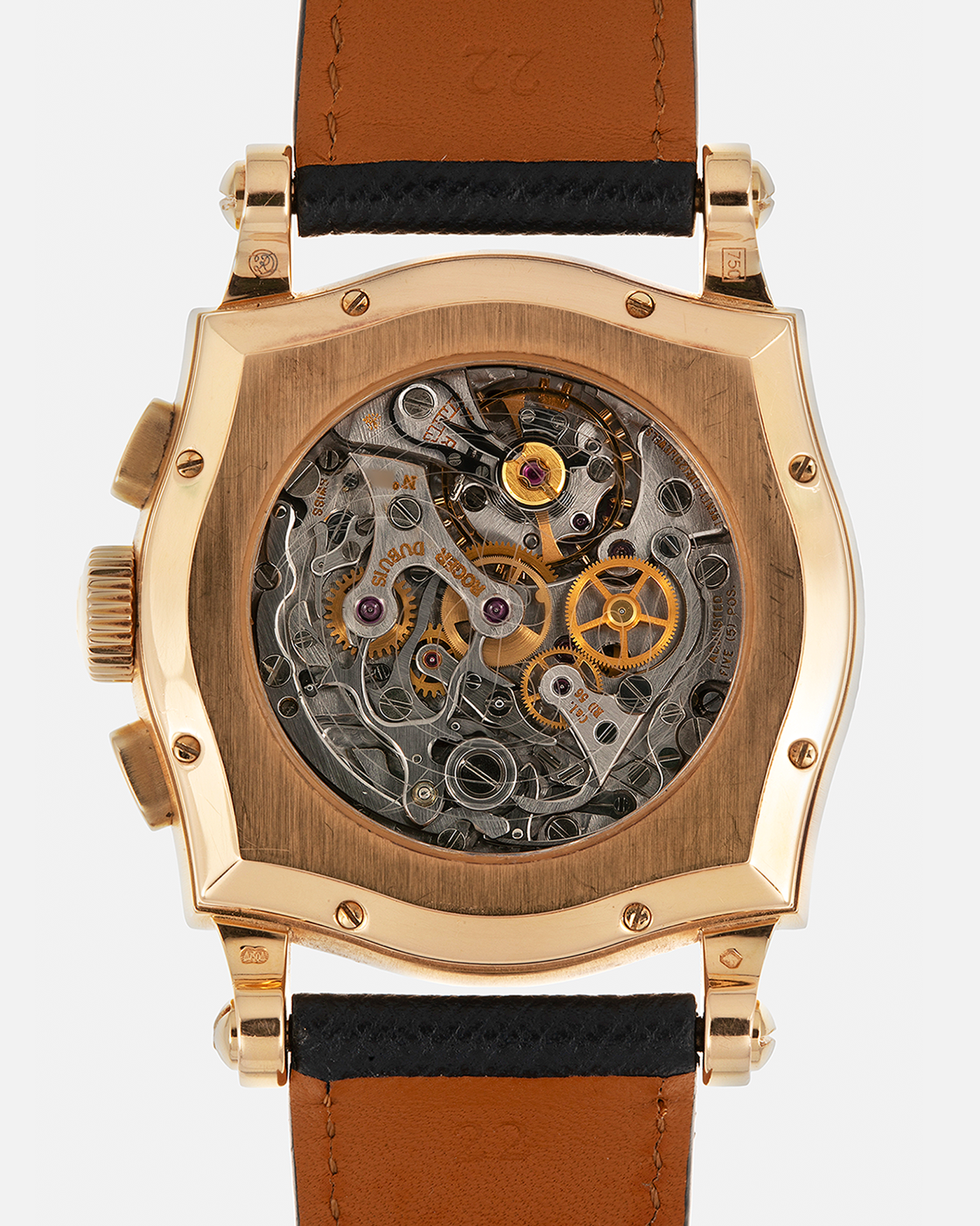 Brand: Roger Dubuis Year: 2000’s Model: Sympathie 40 Biretrograde Chronograph Material: 18-carat Yellow Gold Movement: Roger Dubuis Cal. RD 5630 (Based on the Lemania Cal. 2310), Manual-Winding Case Diameter: 40mm Strap: Molequin Navy Blue Textured Calf Leather Strap with Signed 18-carat Yellow Gold Roger Dubuis Tang Buckle