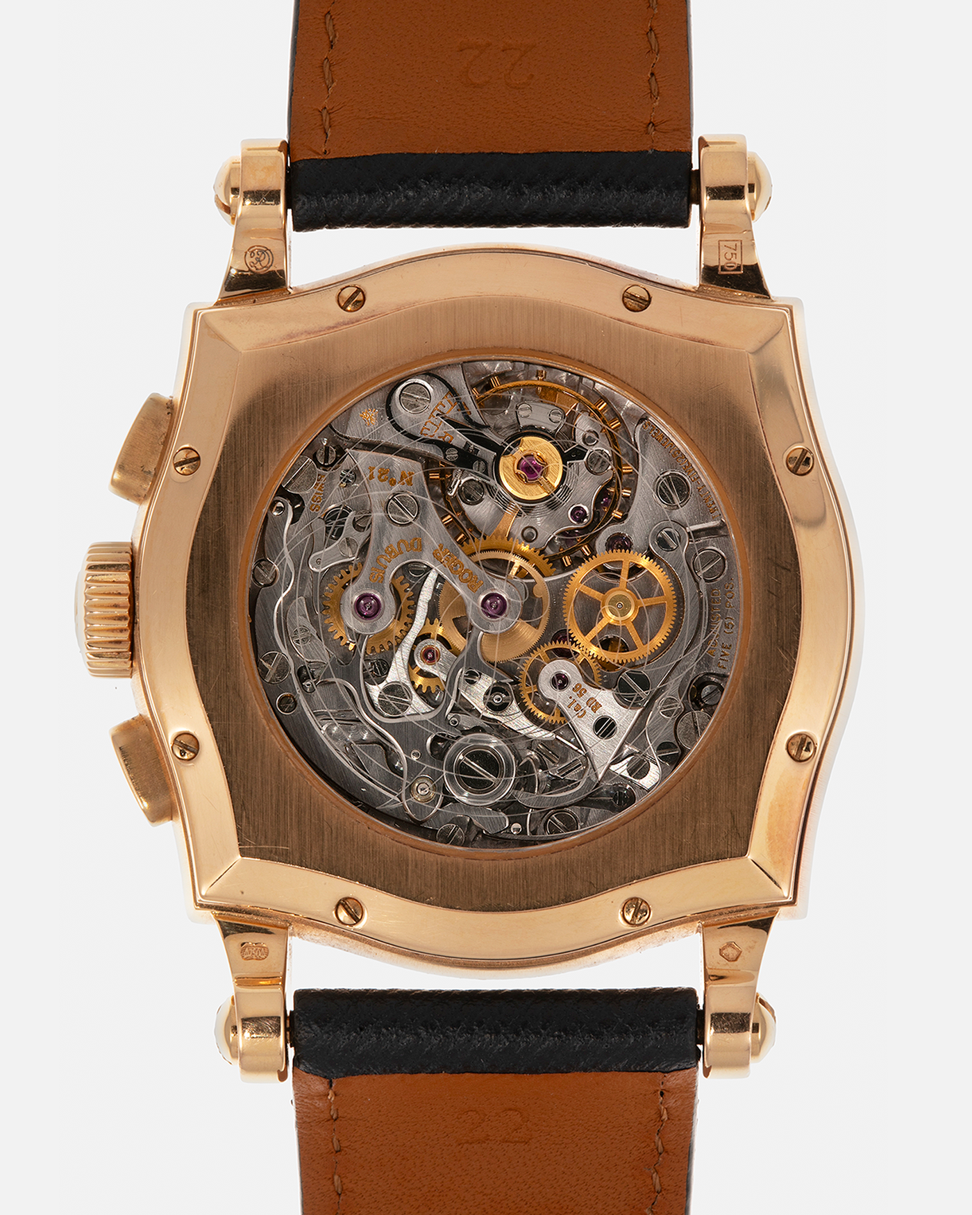 Brand: Roger Dubuis
Year: 2000s
Model: Sympathie 40 Biretrograde Chronograph
Material: 18-carat Yellow Gold
Movement: Roger Dubuis Cal. RD 5630 (Based on the Lemania Cal. 2310), Manual-Winding
Case Dimensions: 40mm x 12.25mm (Lug-to-Lug 47mm)
Lug Width: 22mm
Strap: Molequin Navy Blue Textured Calf Leather Strap with Signed 18-carat Yellow Gold Tang Buckle