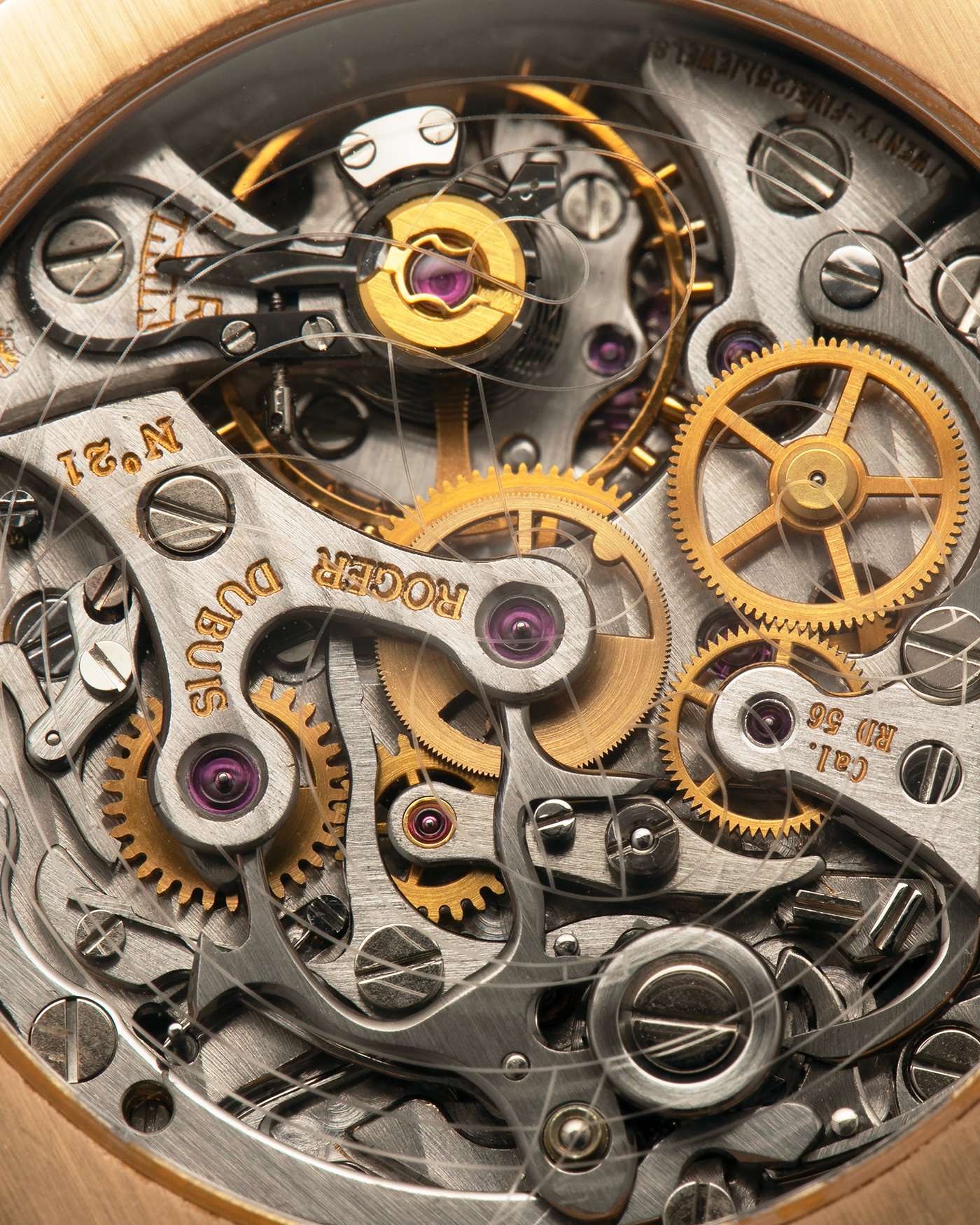 Brand: Roger Dubuis
Year: 2000s
Model: Sympathie 40 Biretrograde Chronograph
Material: 18-carat Yellow Gold
Movement: Roger Dubuis Cal. RD 5630 (Based on the Lemania Cal. 2310), Manual-Winding
Case Dimensions: 40mm x 12.25mm (Lug-to-Lug 47mm)
Lug Width: 22mm
Strap: Molequin Navy Blue Textured Calf Leather Strap with Signed 18-carat Yellow Gold Tang Buckle