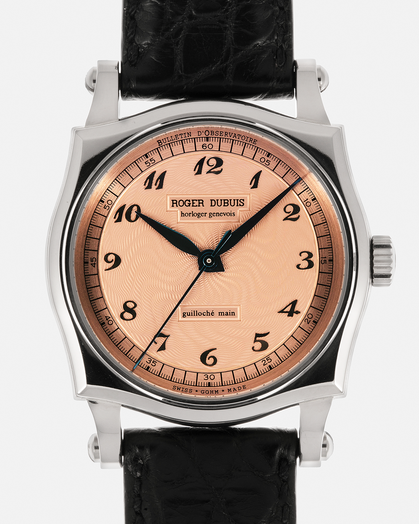 Brand: Roger Dubuis
Year: 2001
Model: Sympathie 37 ‘Salmon Guilloché’, Limited to 28 Pieces
Reference: S37.57.0
Material: 18-carat White Gold
Movement: Roger Dubuis Cal. RD 57, Self-Winding
Case Dimensions: 37mm x 8.5mm (Lug-to-Lug 46.5mm)
Lug Width: 20mm
Strap: Roger Dubuis Black Crocodile Leather Strap with Signed 18-carat White Gold Tang Buckle