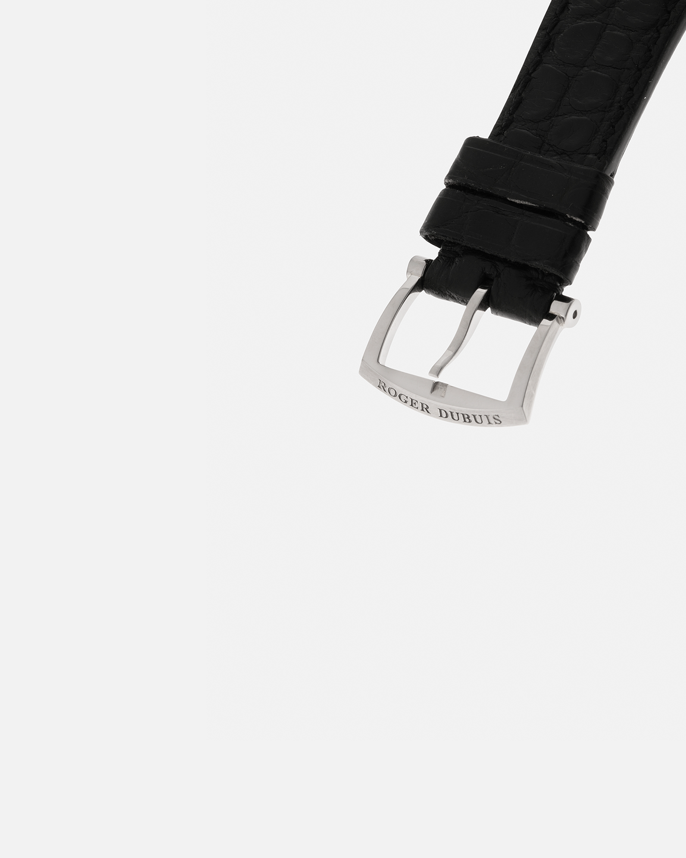 Brand: Roger Dubuis
Year: 2001
Model: Sympathie 37 ‘Salmon Guilloché’, Limited to 28 Pieces
Reference: S37.57.0
Material: 18-carat White Gold
Movement: Roger Dubuis Cal. RD 57, Self-Winding
Case Dimensions: 37mm x 8.5mm (Lug-to-Lug 46.5mm)
Lug Width: 20mm
Strap: Roger Dubuis Black Crocodile Leather Strap with Signed 18-carat White Gold Tang Buckle