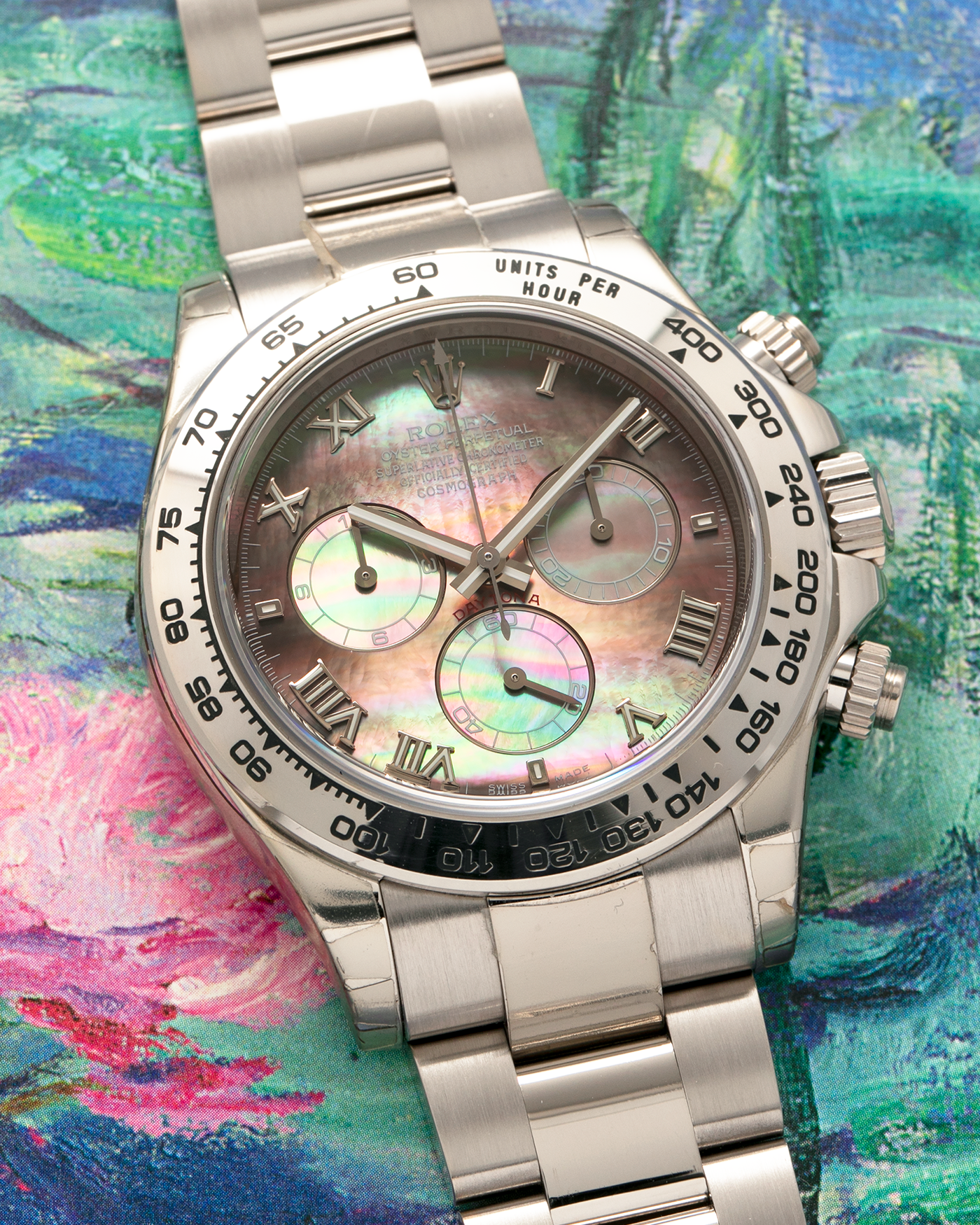 Brand: Rolex
Year: 2007
Model: Cosmograph Daytona
Reference: 116509
Material: 18-carat White Gold Case, Black Tahitian Mother-of-Pearl Dial
Movement: Rolex Cal. 4130, Self-Winding
Case Dimensions: 40mm x 12.4mm (47.6mm Lug-to-Lug)
Lug Width: 20mm
Bracelet: Rolex 78499 Oyster Bracelet in 18-carat White Gold with Signed Oysterlock Clasp