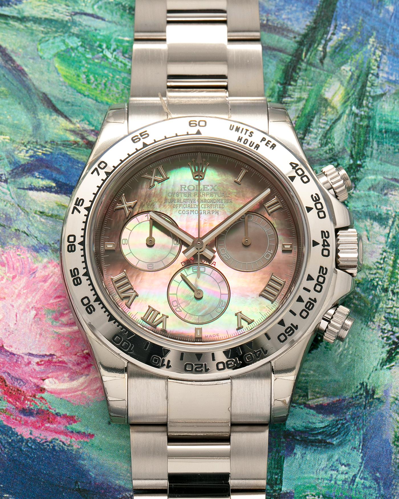 Brand: Rolex
Year: 2007
Model: Cosmograph Daytona
Reference: 116509
Material: 18-carat White Gold Case, Black Tahitian Mother-of-Pearl Dial
Movement: Rolex Cal. 4130, Self-Winding
Case Dimensions: 40mm x 12.4mm (47.6mm Lug-to-Lug)
Lug Width: 20mm
Bracelet: Rolex 78499 Oyster Bracelet in 18-carat White Gold with Signed Oysterlock Clasp