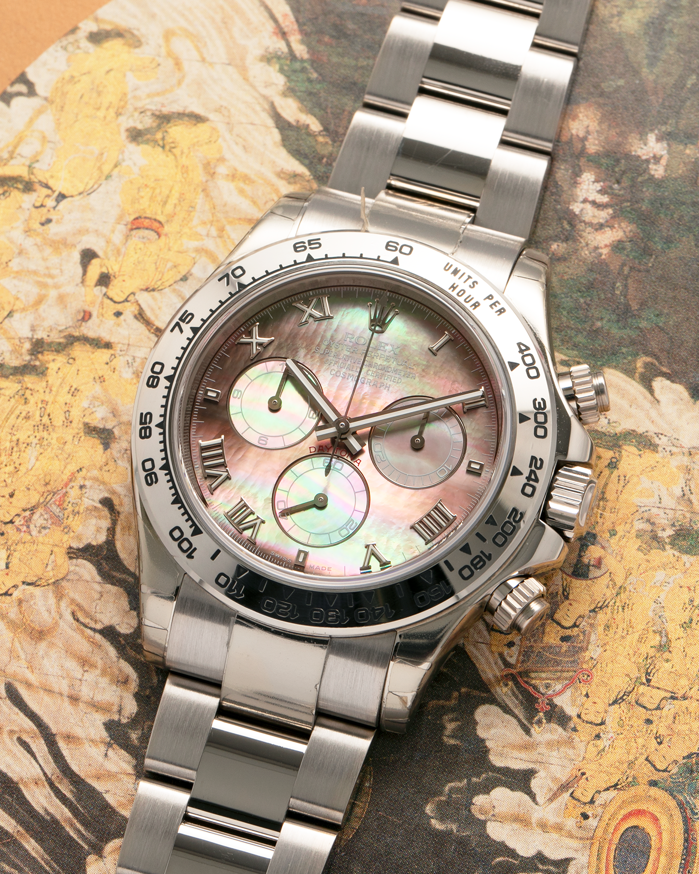 Brand: Rolex
Year: 2007
Model: Cosmograph Daytona
Reference: 116509
Material: 18-carat White Gold Case, Black Tahitian Mother-of-Pearl Dial
Movement: Rolex Cal. 4130, Self-Winding
Case Dimensions: 40mm x 12.4mm (47.6mm Lug-to-Lug)
Lug Width: 20mm
Bracelet: Rolex 78499 Oyster Bracelet in 18-carat White Gold with Signed Oysterlock Clasp
