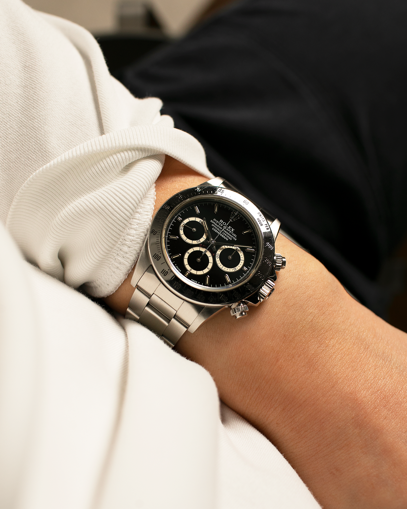 Brand: Rolex
Year: 1991
Model: Cosmograph Daytona ‘Inverted 6’
Reference: 16520
Serial Number: N646XXX
Material: Stainless Steel
Movement: Rolex Cal. 4030 (Based on the Zenith El Primero Cal. 400), Self-Winding
Case Dimensions: 40mm x 12mm (Lug-to-Lug 47mm)
Lug Width: 20mm
Bracelet: Rolex Stainless Steel 78360 Oyster Bracelet with Signed ‘P11’ Marked Clasp